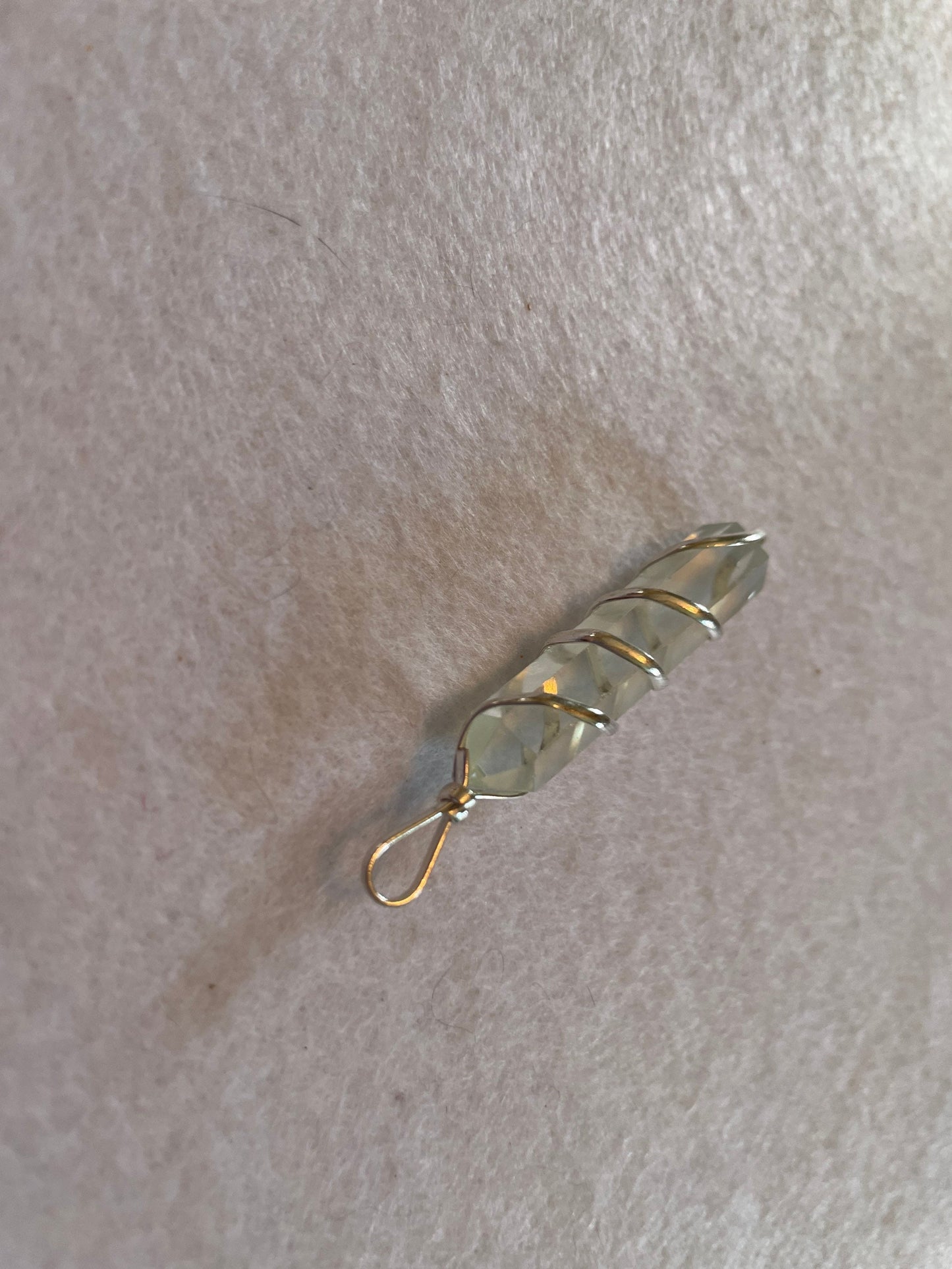 Beautiful Clear Quartz Point Pendant is  1.50” and is attached to precious silver making the total length 2”