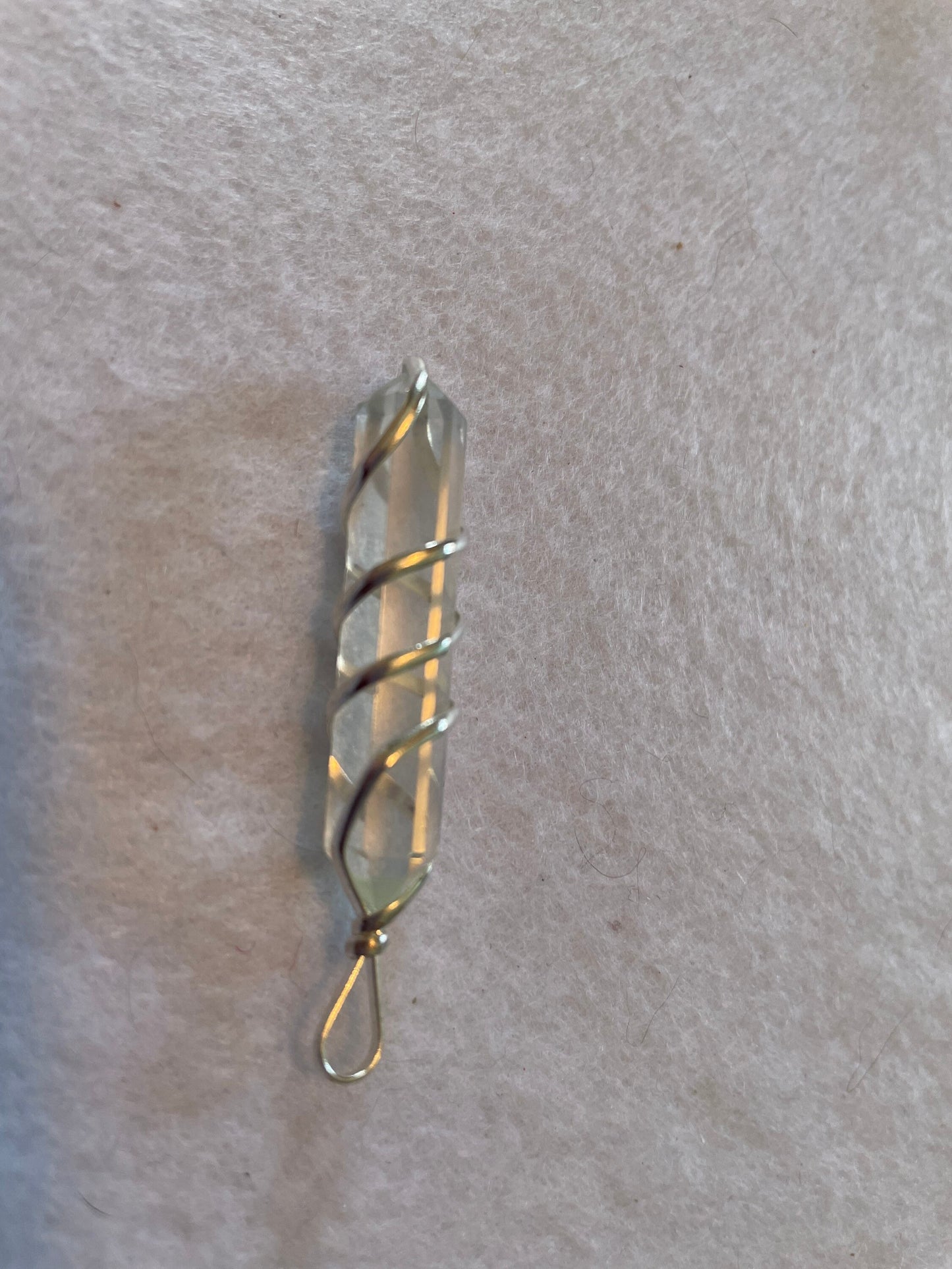 Beautiful Clear Quartz Point Pendant is  1.50” and is attached to precious silver making the total length 2”