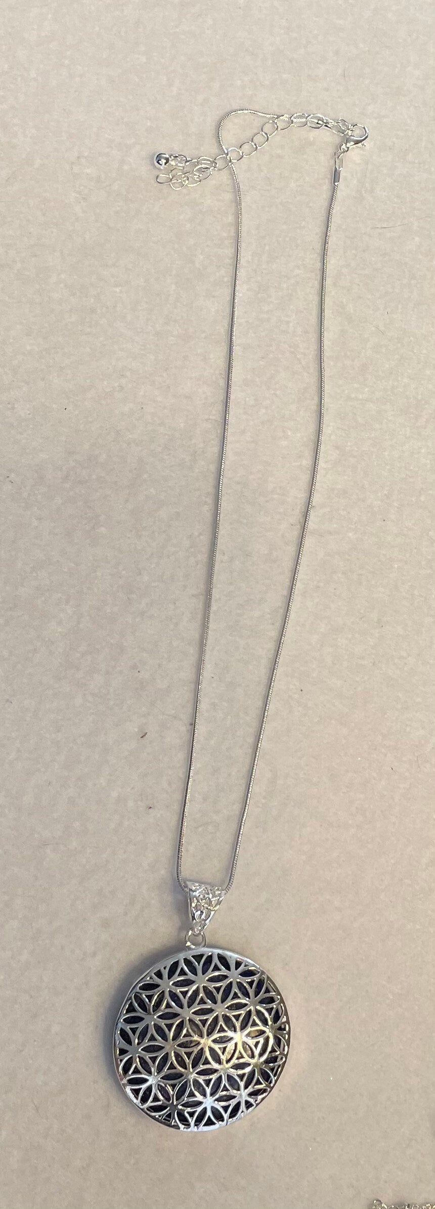 Silver round Flower of Life Lapis Lazuli crystal necklace on 16+ inch silver plated chain