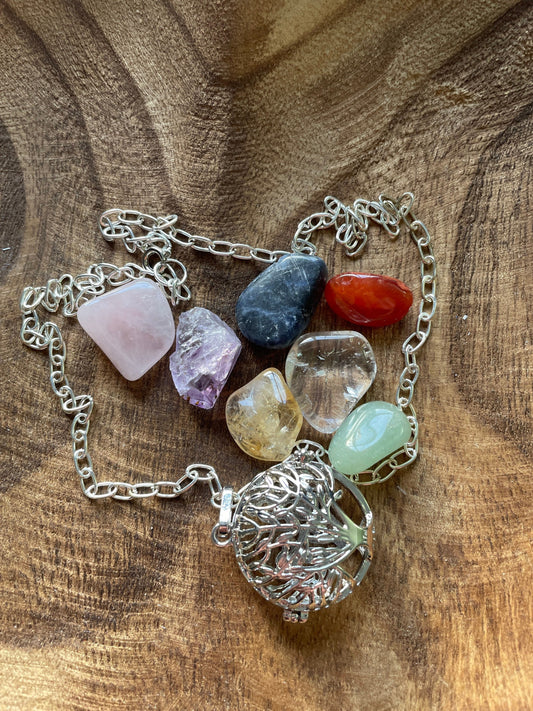 Silver round Tree of Life locket with 7 interchangeable crystals on 16+ inch silver plated chain