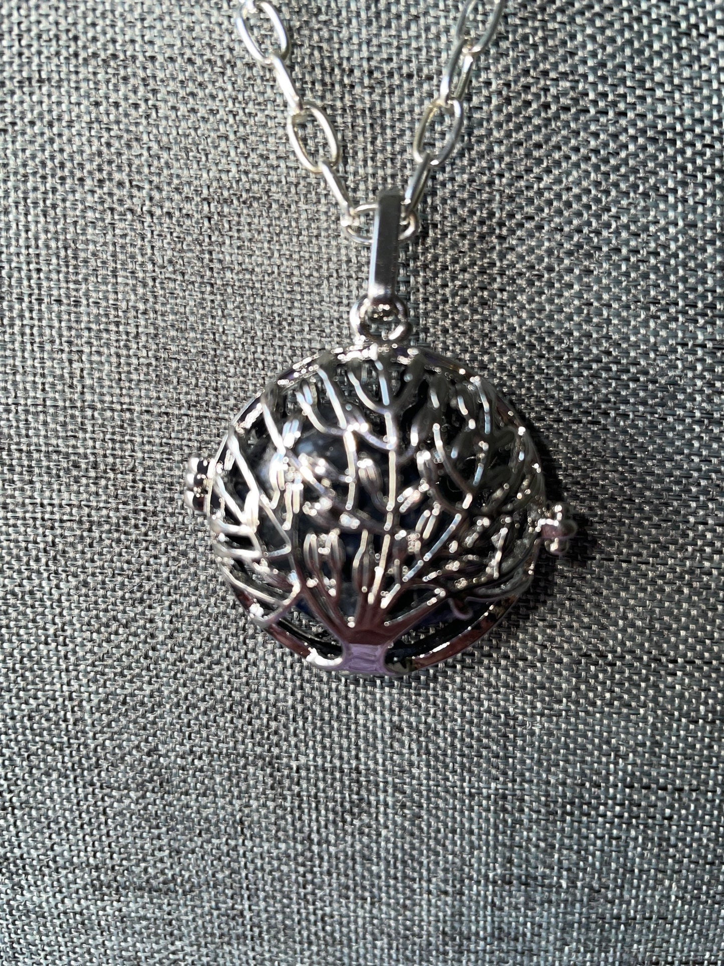 Silver round Tree of Life locket with 7 interchangeable crystals on 16+ inch silver plated chain
