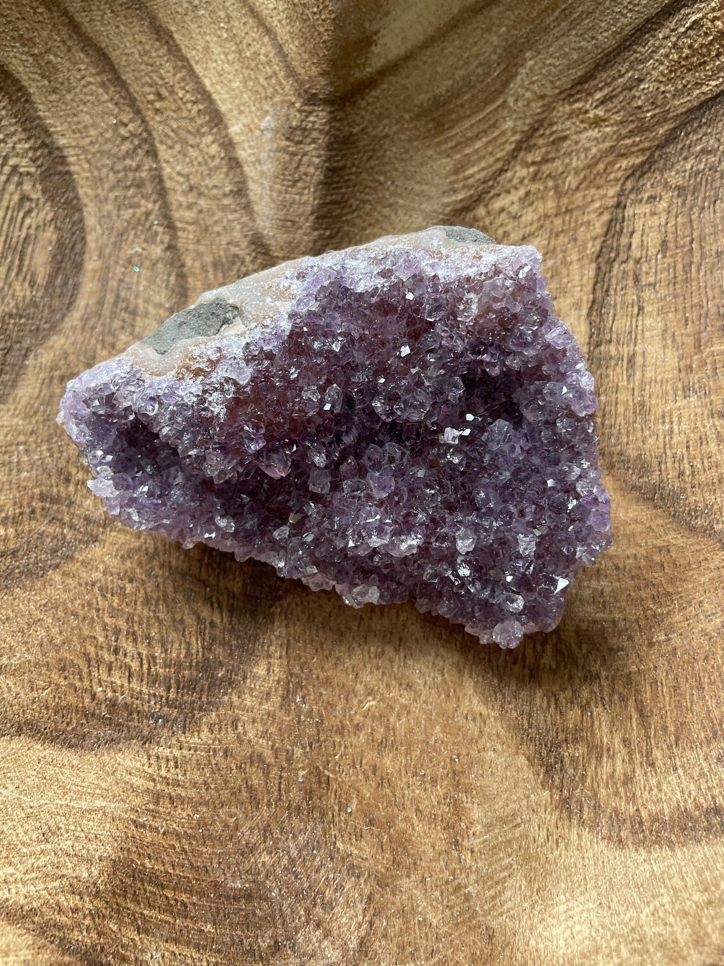 This beautiful Uruguay amethyst cluster is a perfect gift for any Aquarius or February birthday.