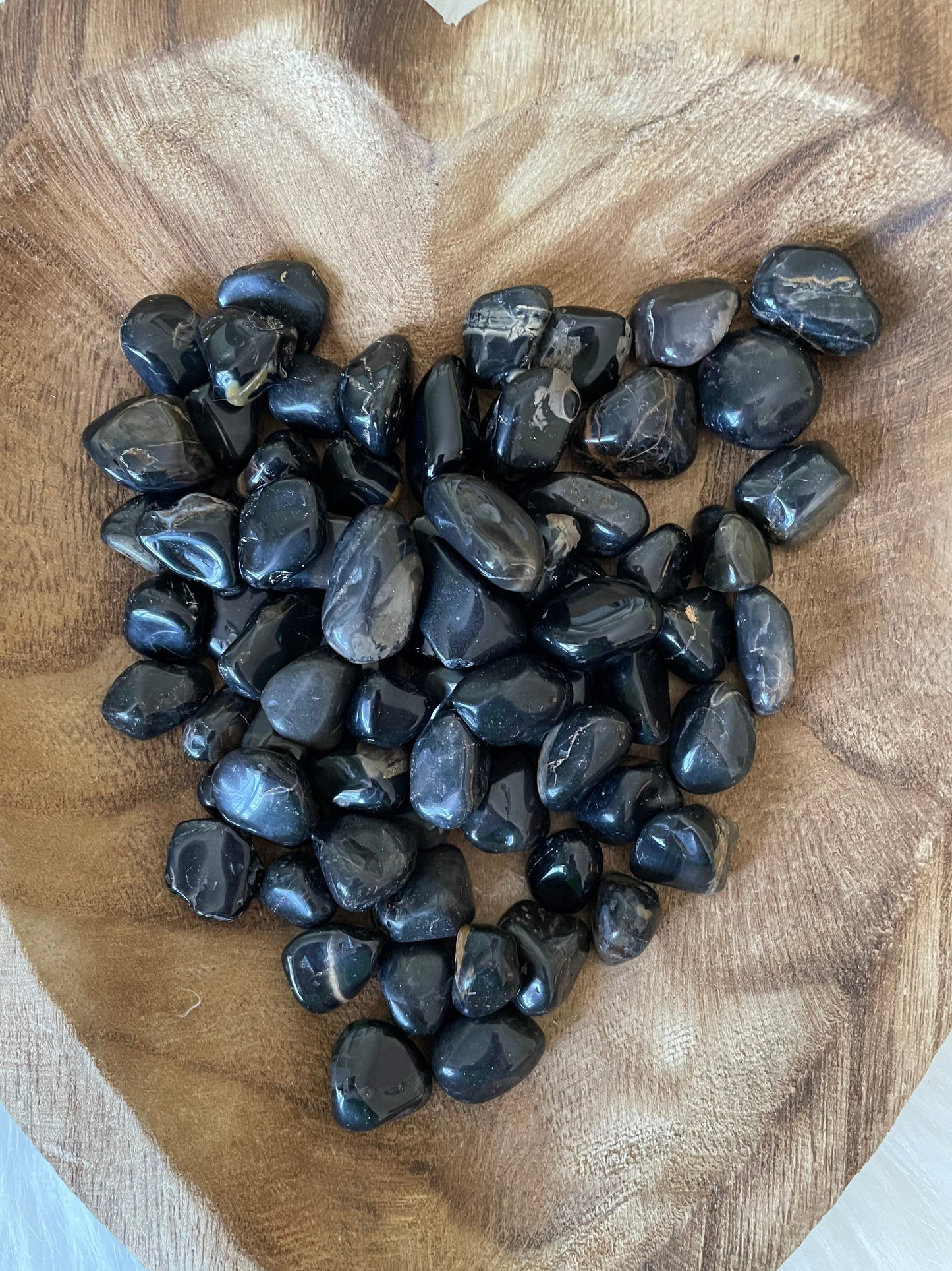 Powerful protective black onyx tumbles large size