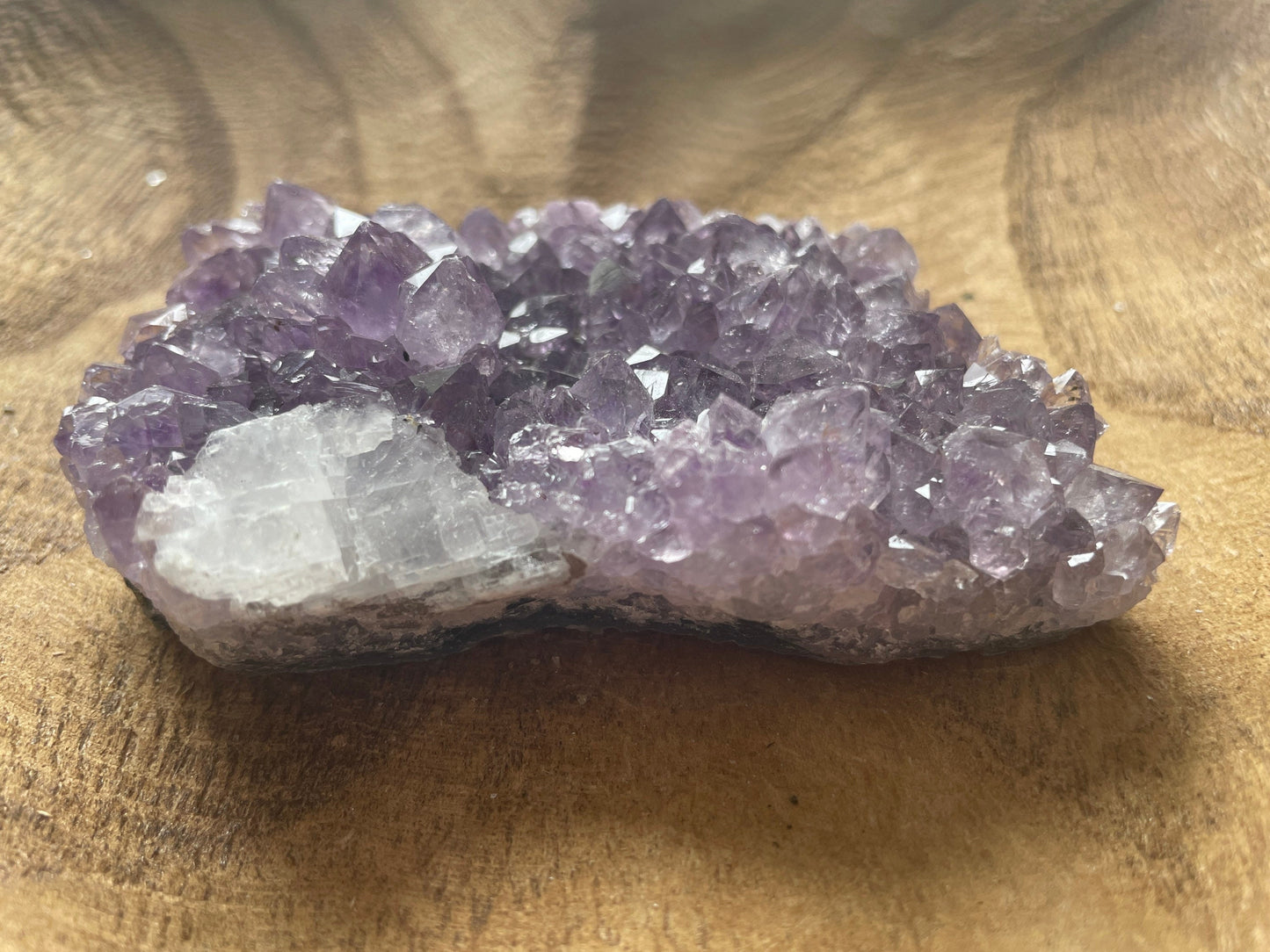 Uruguay amethyst cluster with a bit of Quartz is a perfect gift for any Aquarius or February birthday.