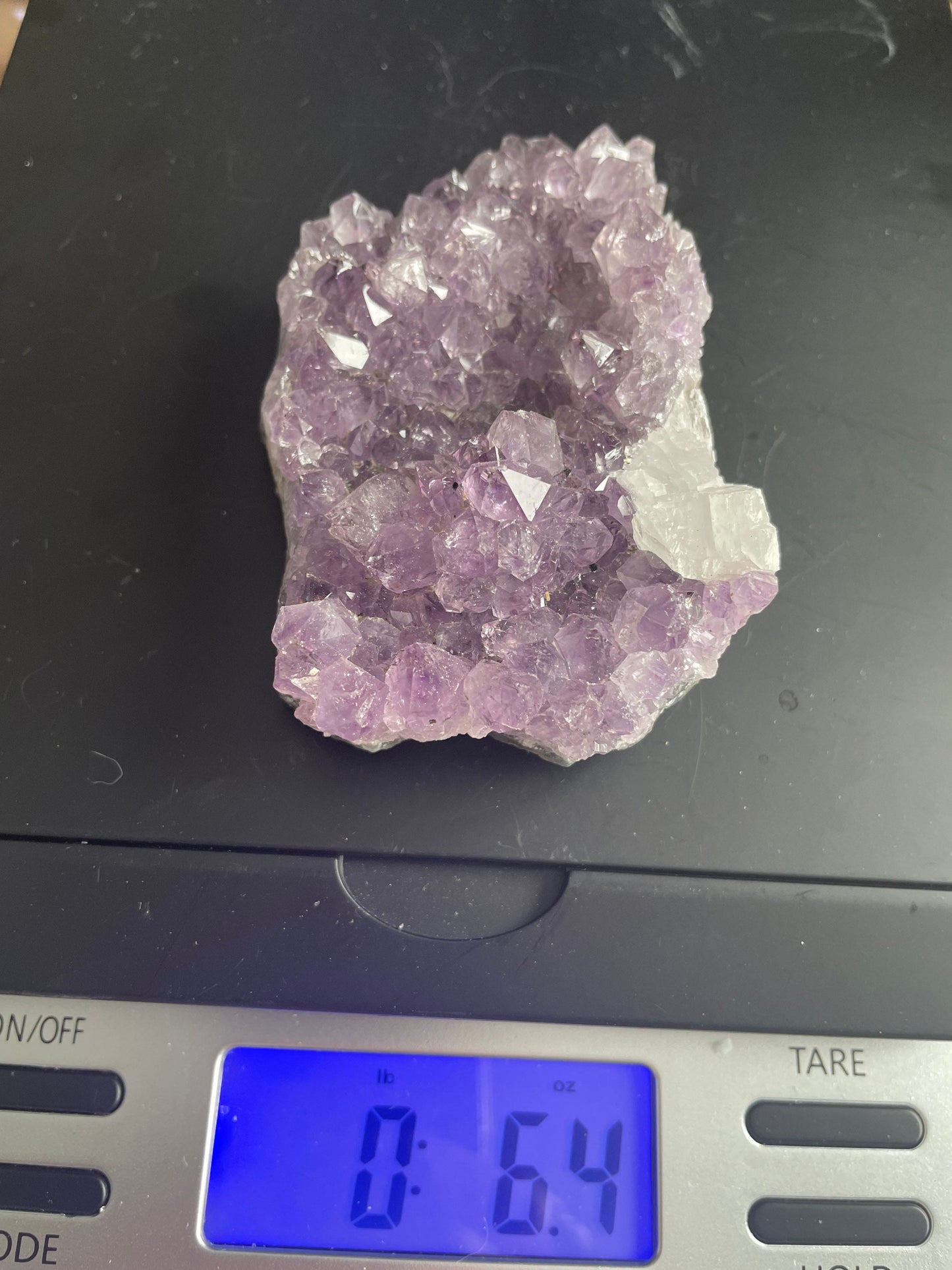 Uruguay amethyst cluster with a bit of Quartz is a perfect gift for any Aquarius or February birthday.