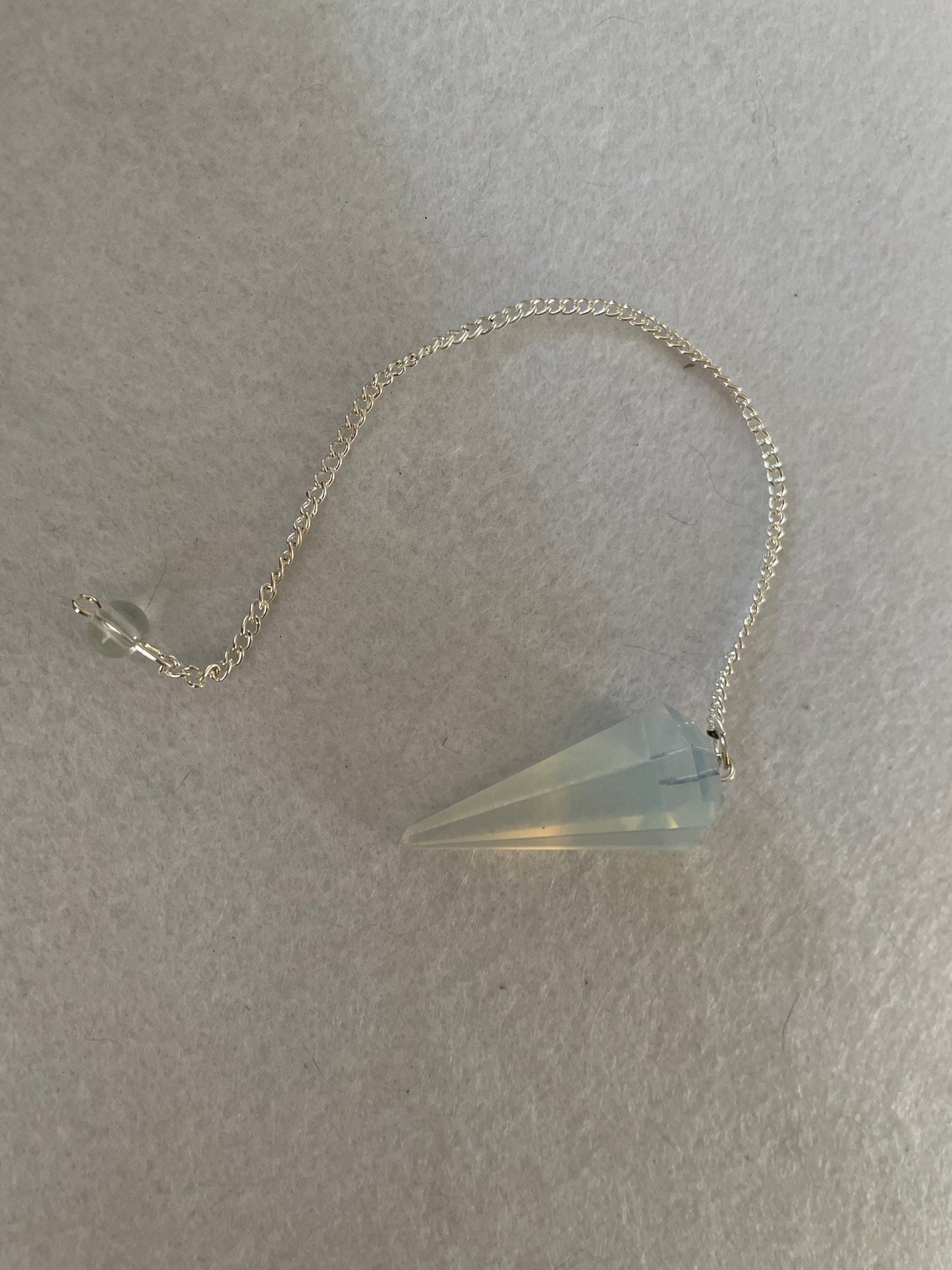 Gorgeous Opalite pendulum is approximately 1.65” and with chain is 8.5” total length