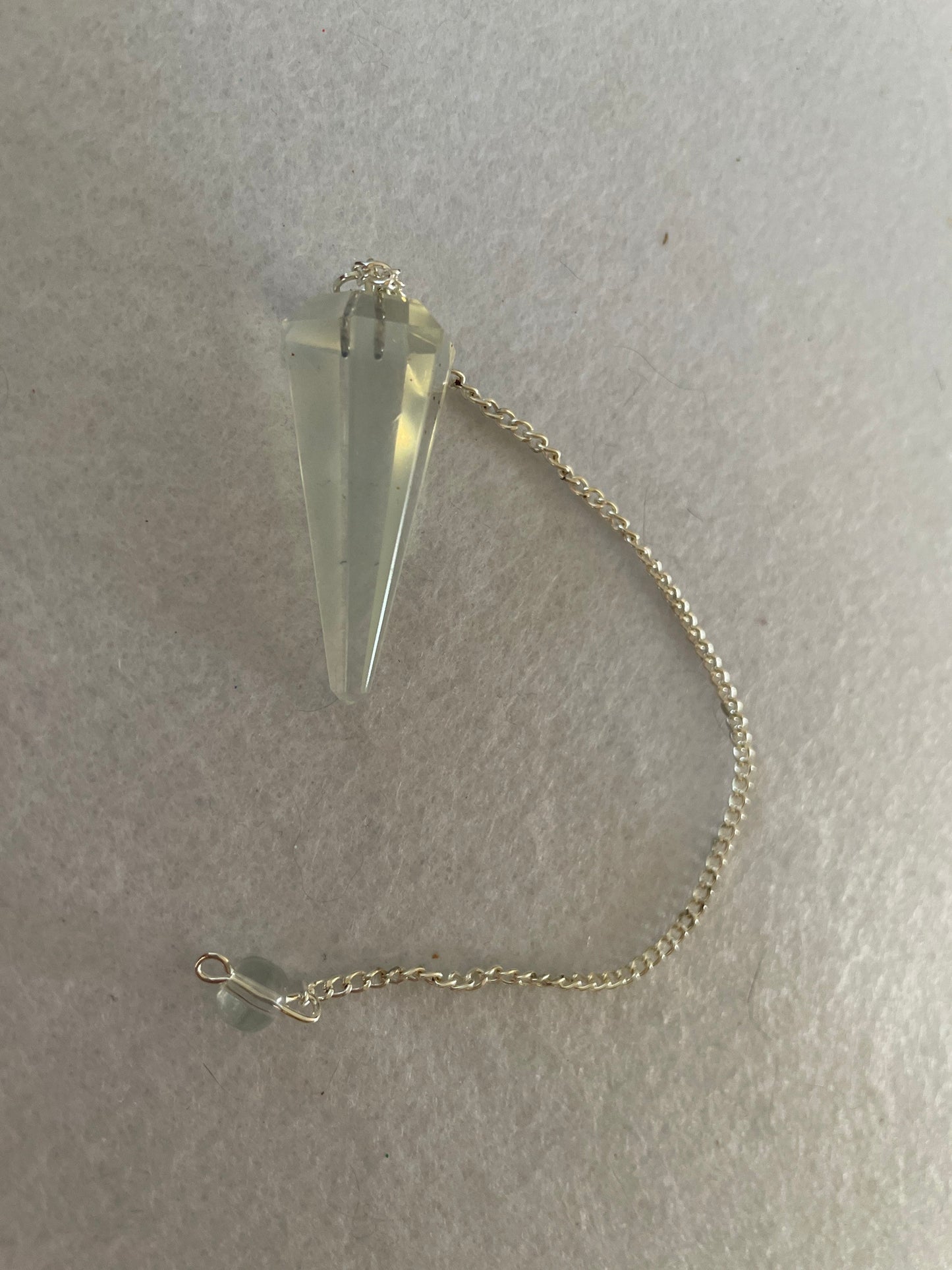 Beautiful Opalite pendulum is approximately 1.5” and with chain is 8.25” total length.