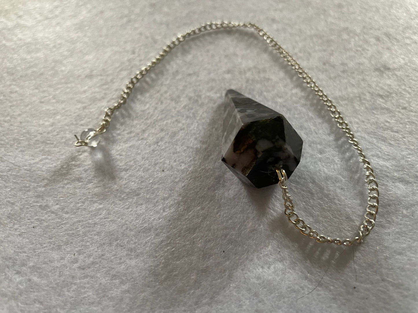This beautiful Gabbro pendulum is approximately 1.5” and with chain is 9.5” total length.