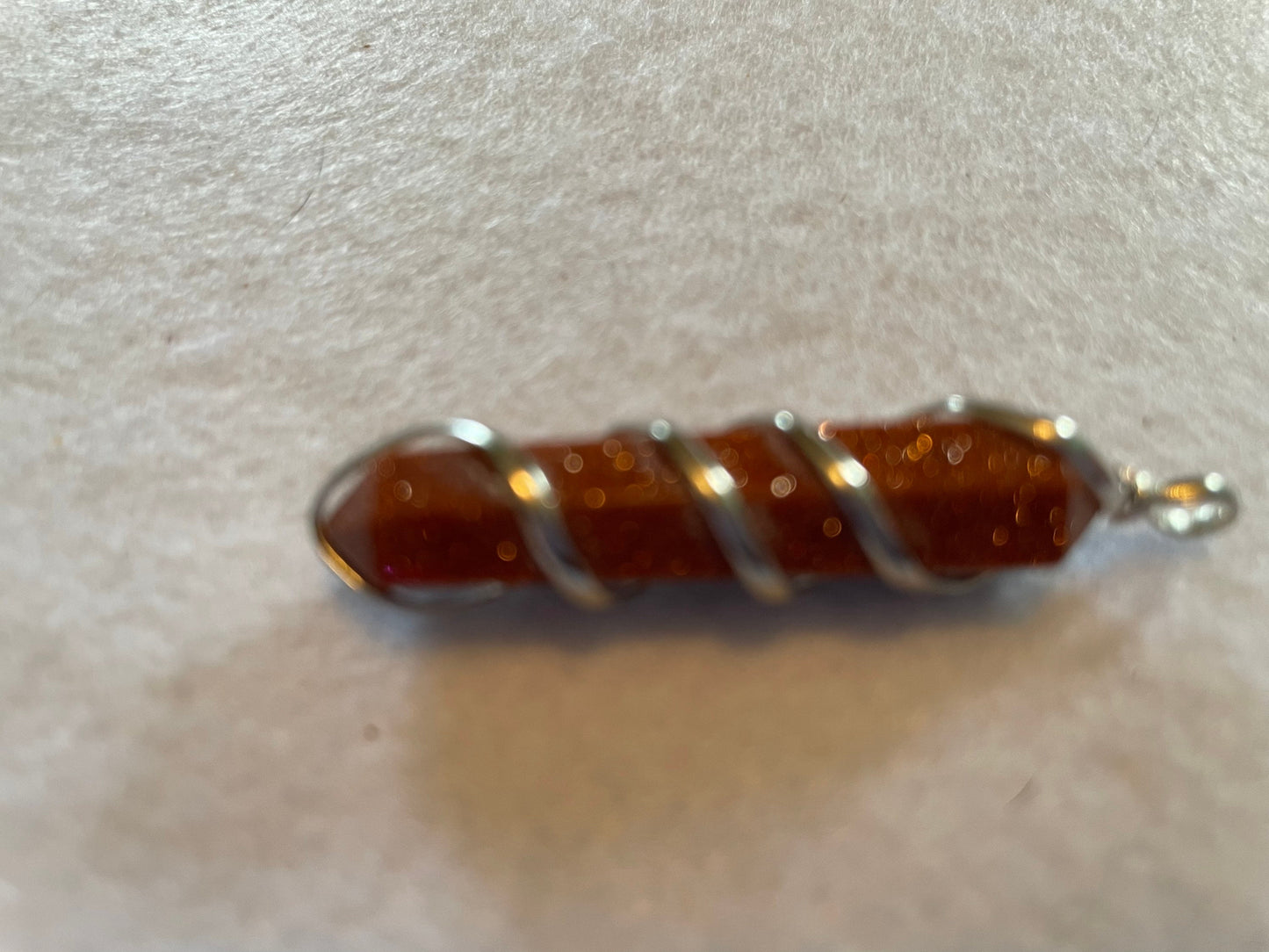 Gorgeous Goldstone Point Pendant is 1.5”