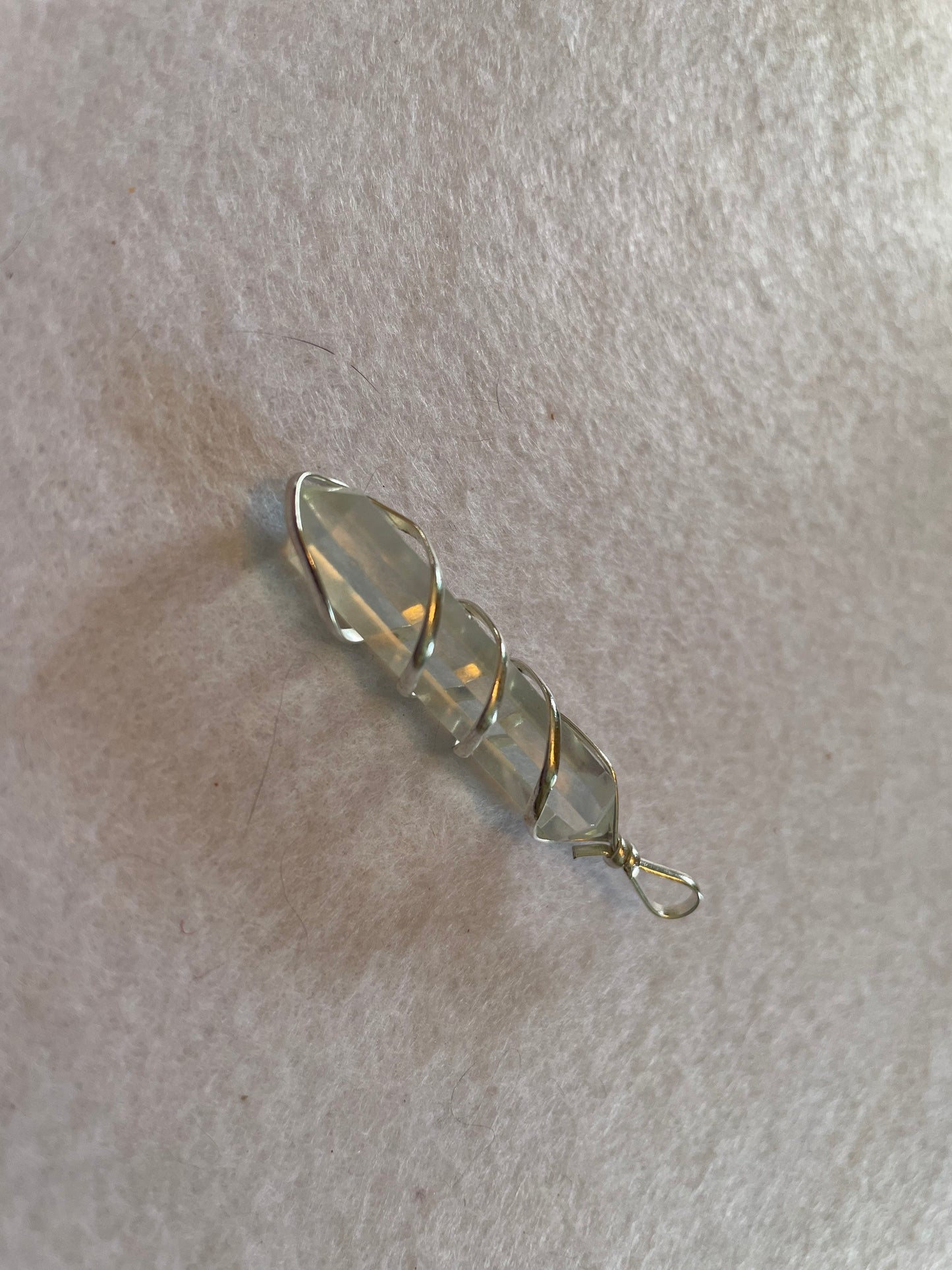 Beautiful Clear Quartz Point Pendant is  1.50” and is attached to precious silver making the total length 2”