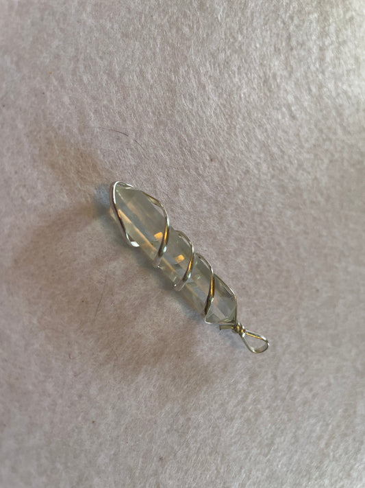 Beautiful Clear Quartz Point Pendant is  1.50” and is attached to precious silver making the total length 2”