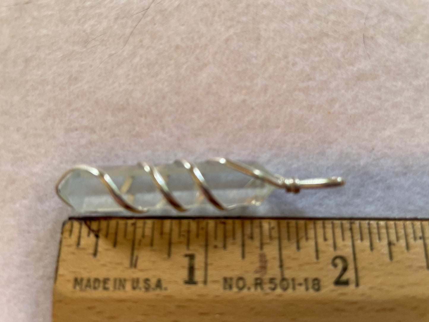 Beautiful Clear Quartz Point Pendant is  1.50” and is attached to precious silver making the total length 2”