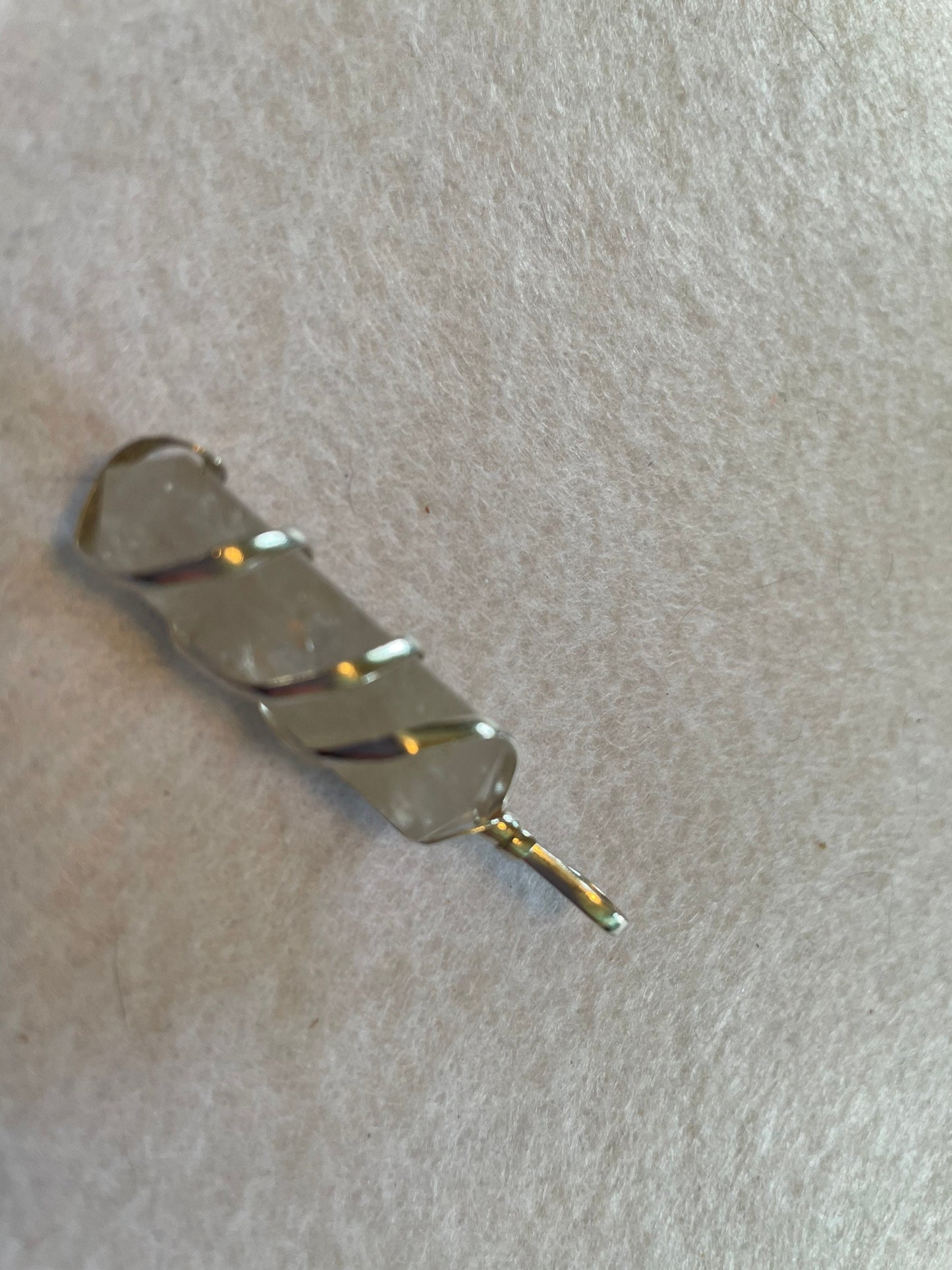 Beautiful Clear Quartz Point Pendant is  1.50” and is attached to precious silver making the total length 2”