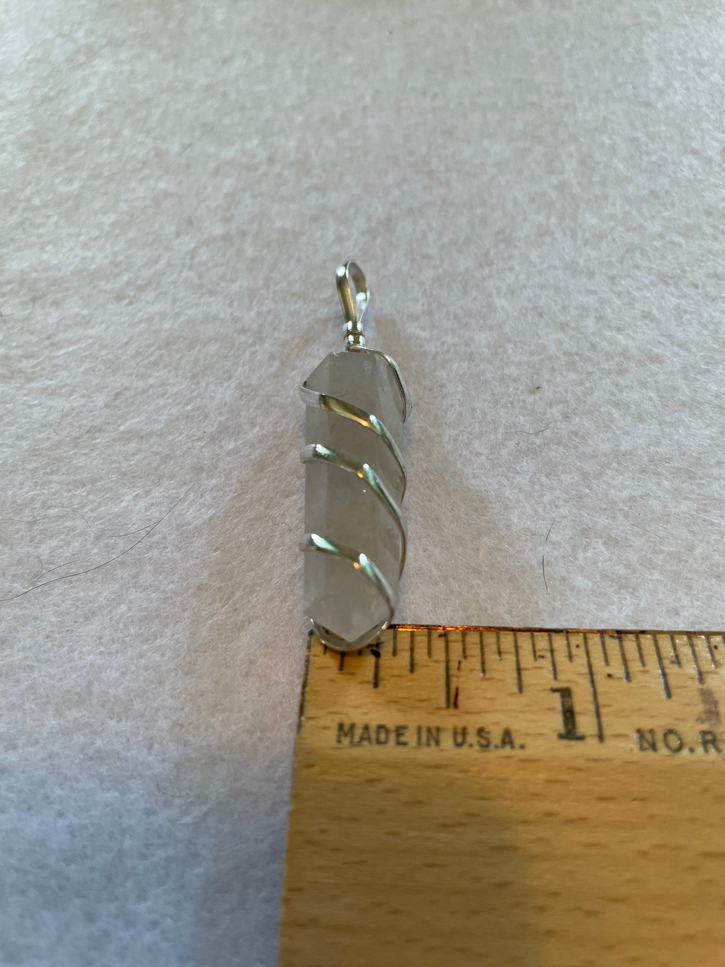 Beautiful Clear Quartz Point Pendant is  1.50” and is attached to precious silver making the total length 2”