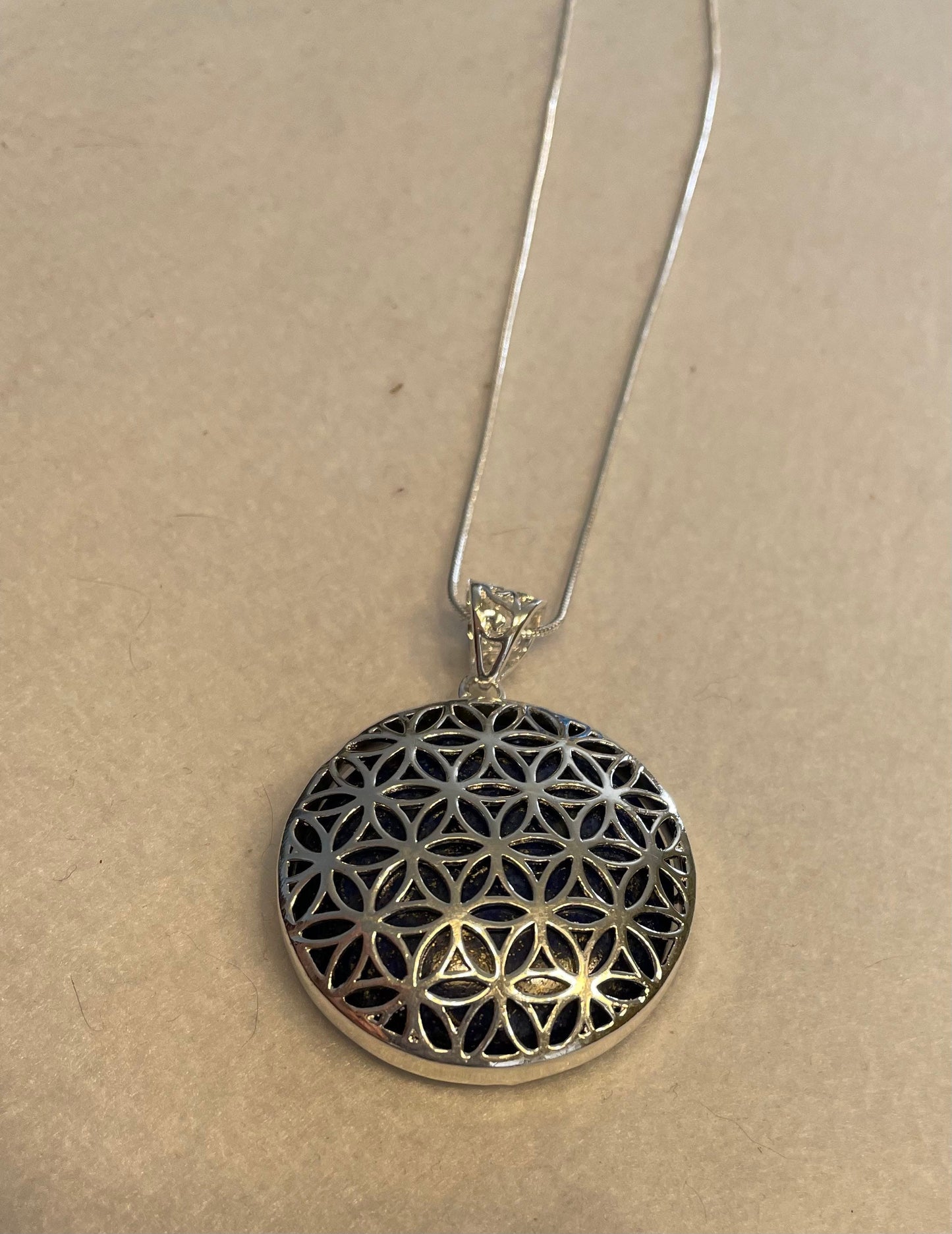 Silver round Flower of Life Lapis Lazuli crystal necklace on 16+ inch silver plated chain