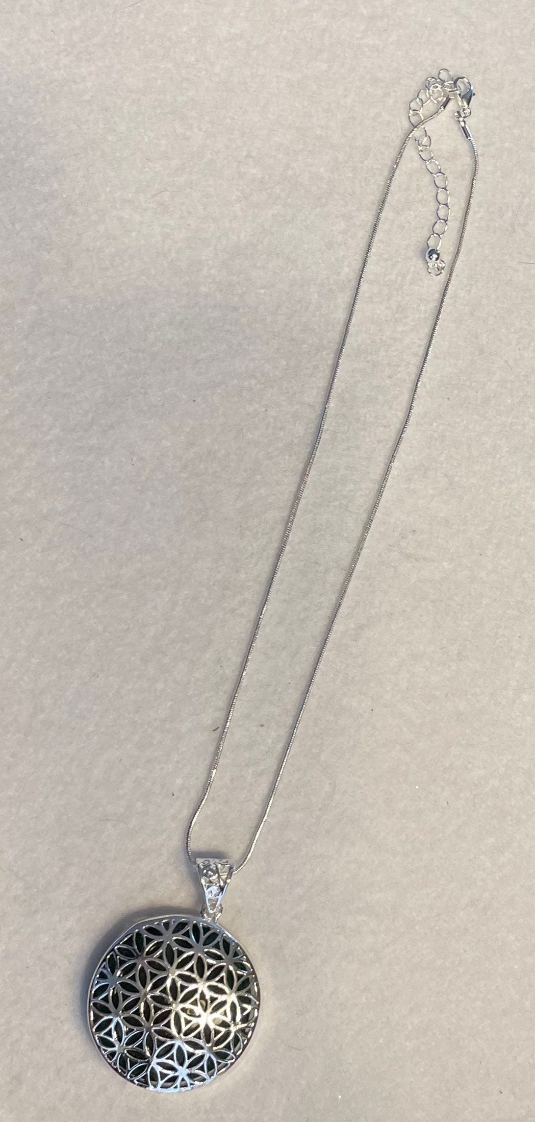 Silver round Flower of Life Lapis Lazuli crystal necklace on 16+ inch silver plated chain