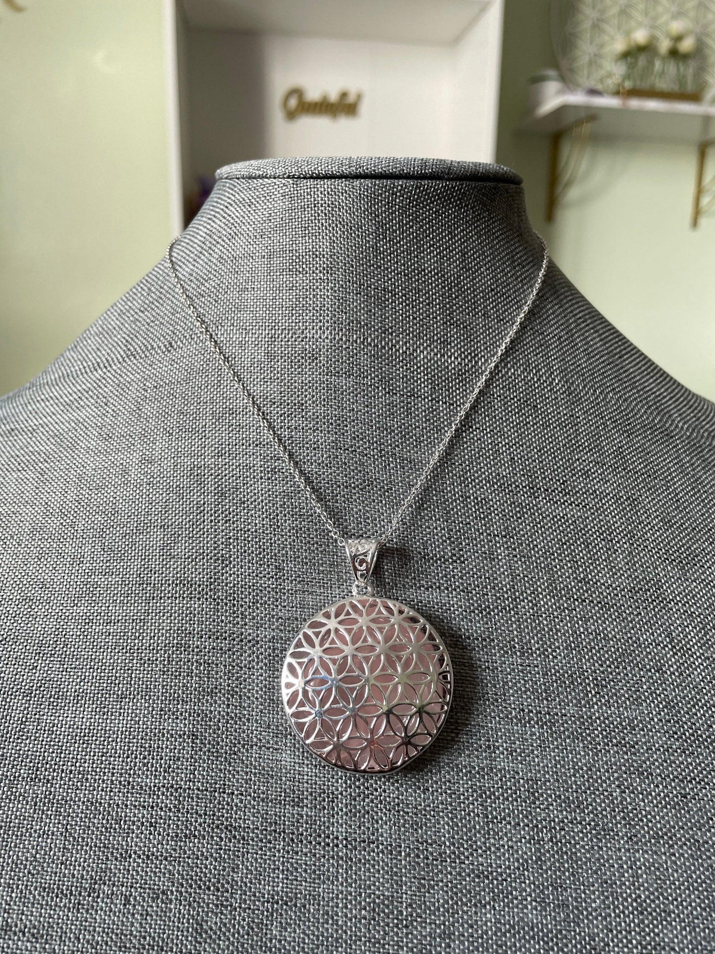 Silver round Flower of Life Rose Quartz crystal necklace on 16+ inch silver plated chain