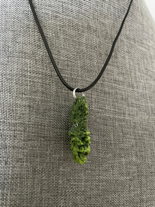 Greenman pendant necklace on black cord.