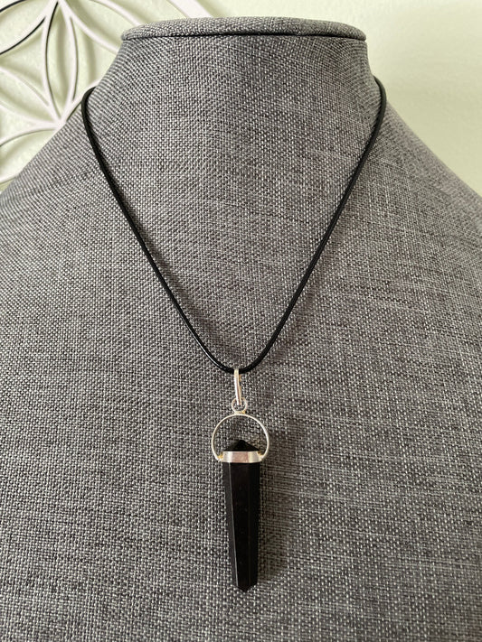 Gorgeous black obsidian point pendant wrapped with silver on a nylon cord