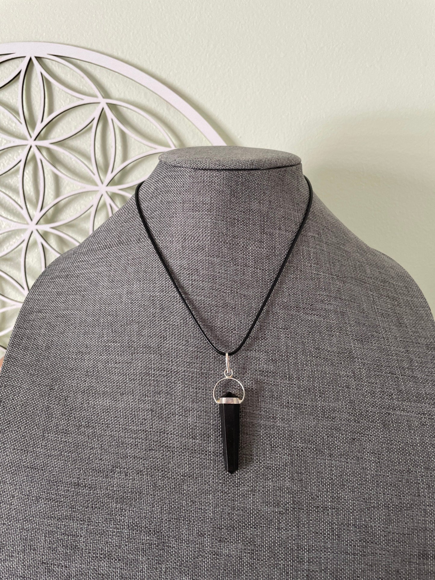 Gorgeous black obsidian point pendant wrapped with silver on a nylon cord