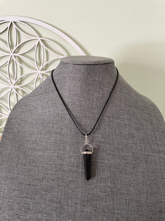 Gorgeous black obsidian point pendant wrapped with silver on a nylon cord