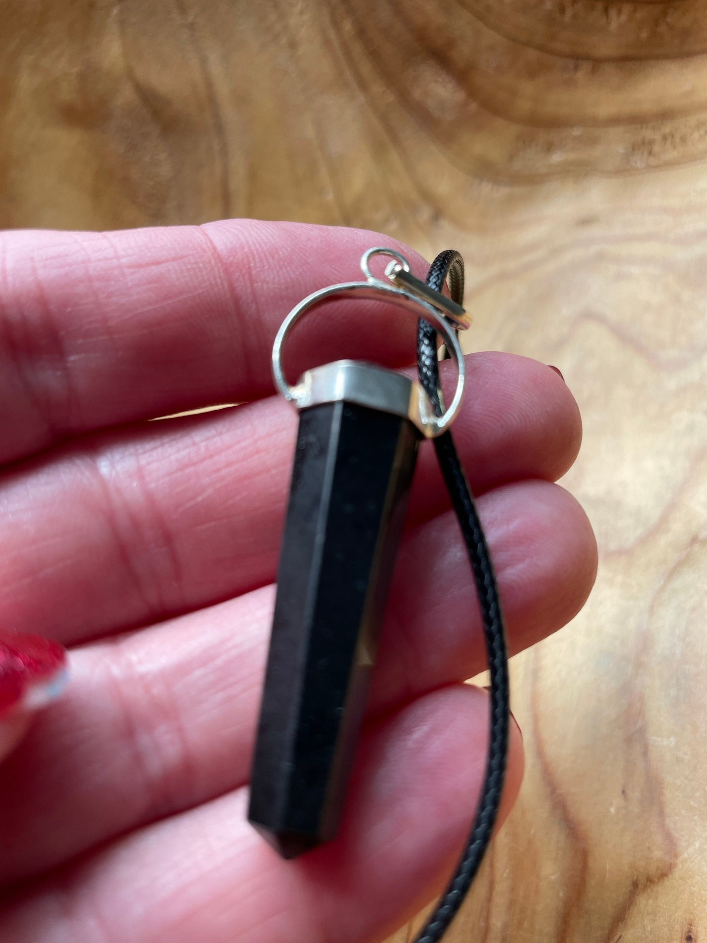 Gorgeous black obsidian point pendant wrapped with silver on a nylon cord