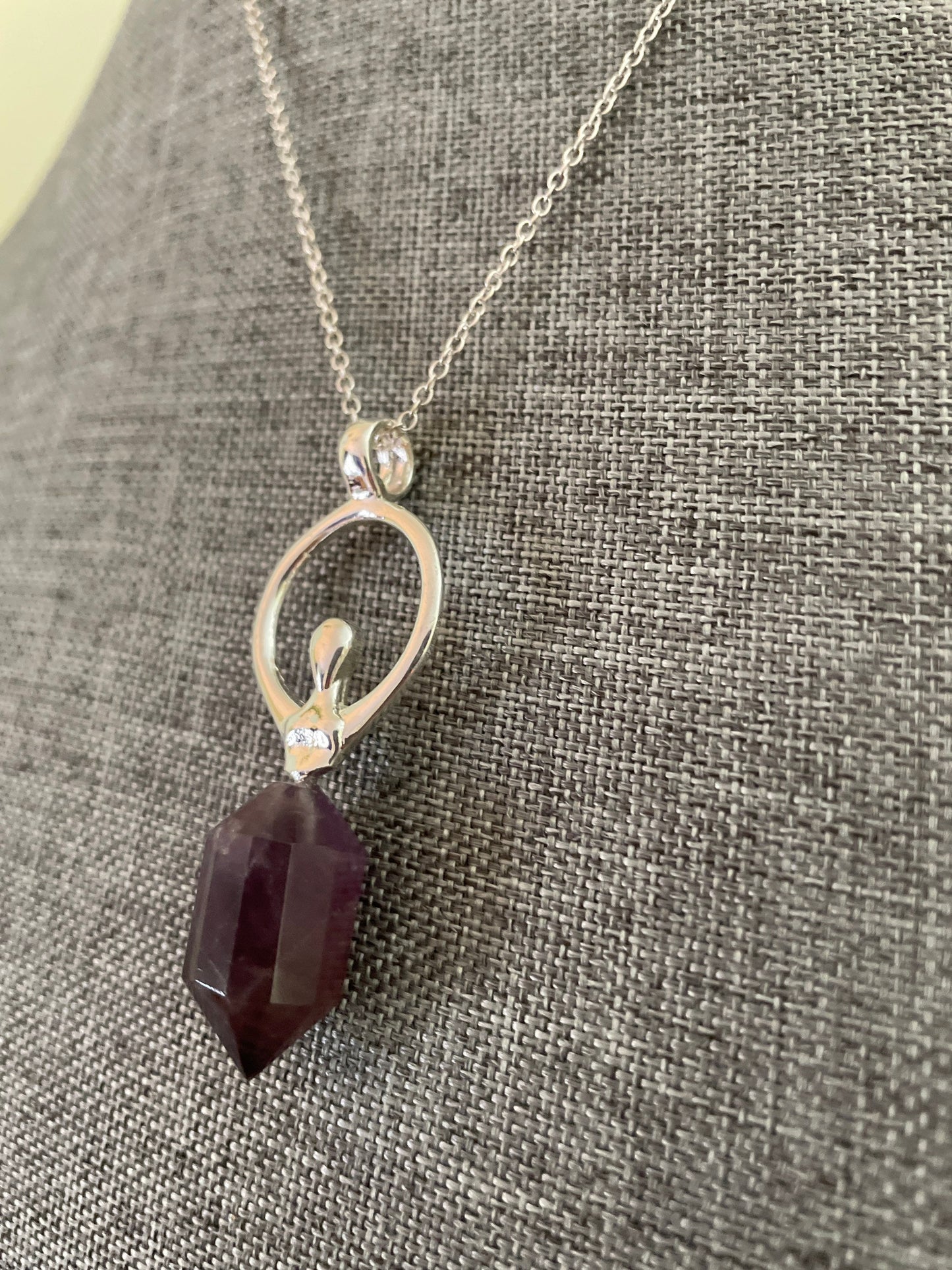 Beautiful silver and amethyst Goddess pendant on silver plated chain
