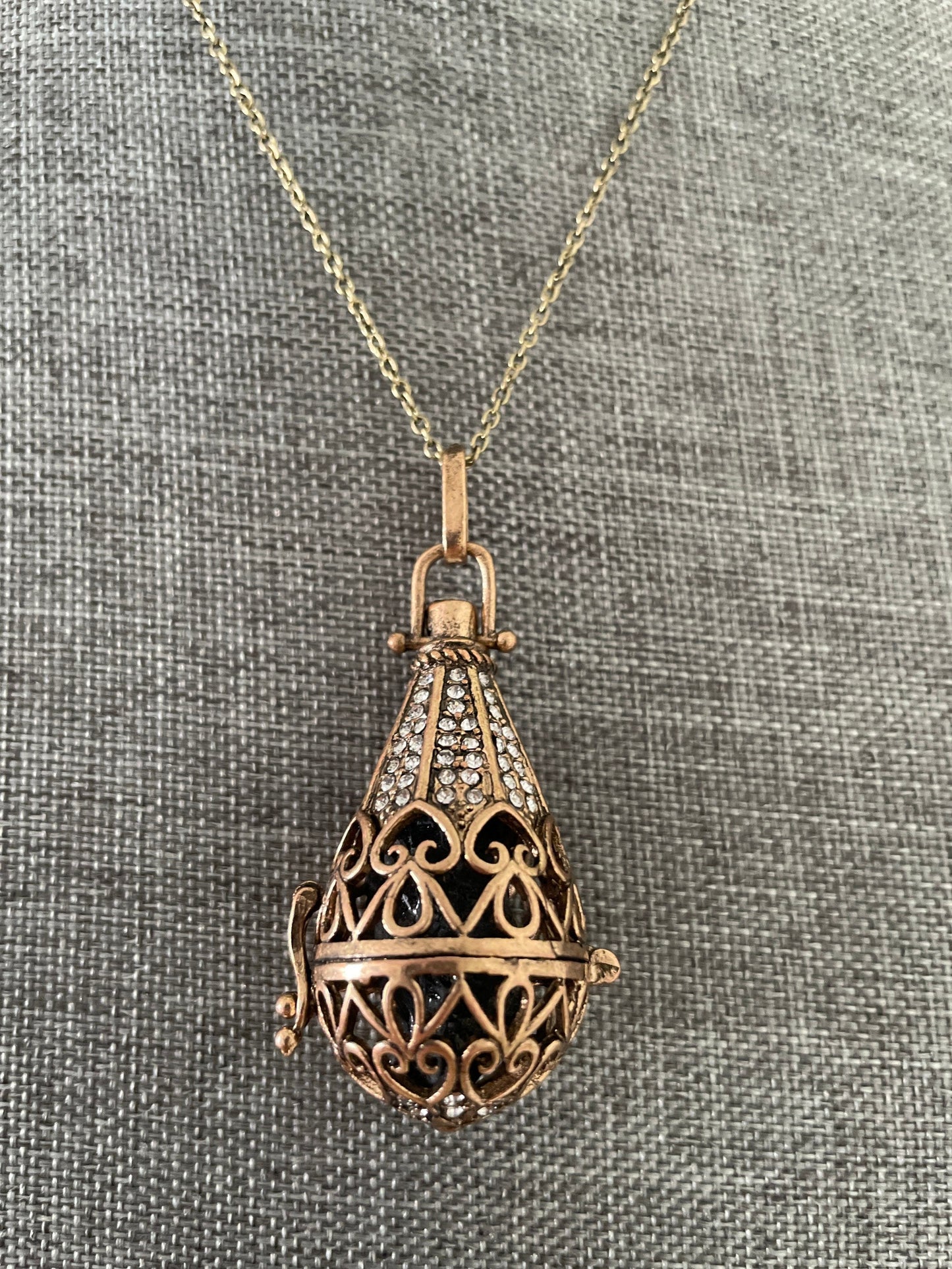 Antique Gold locket with 6 interchangeable crystals on 16” antique gold chain