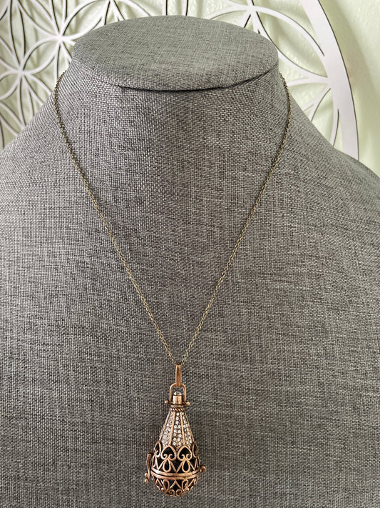 Antique Gold locket with 6 interchangeable crystals on 16” antique gold chain