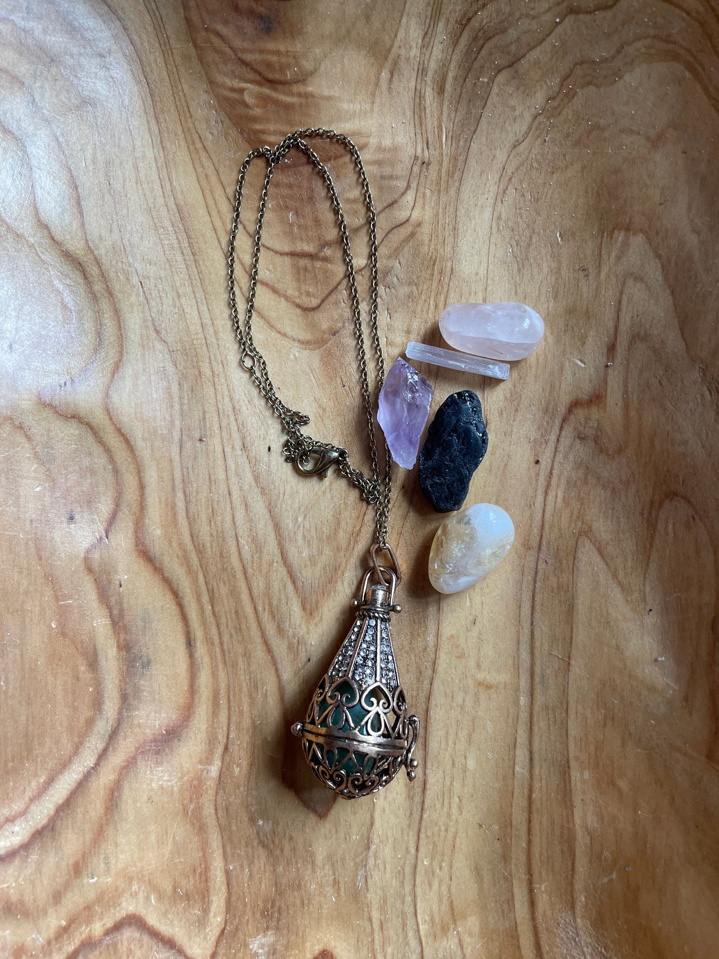 Antique Gold locket with 6 interchangeable crystals on 16” antique gold chain