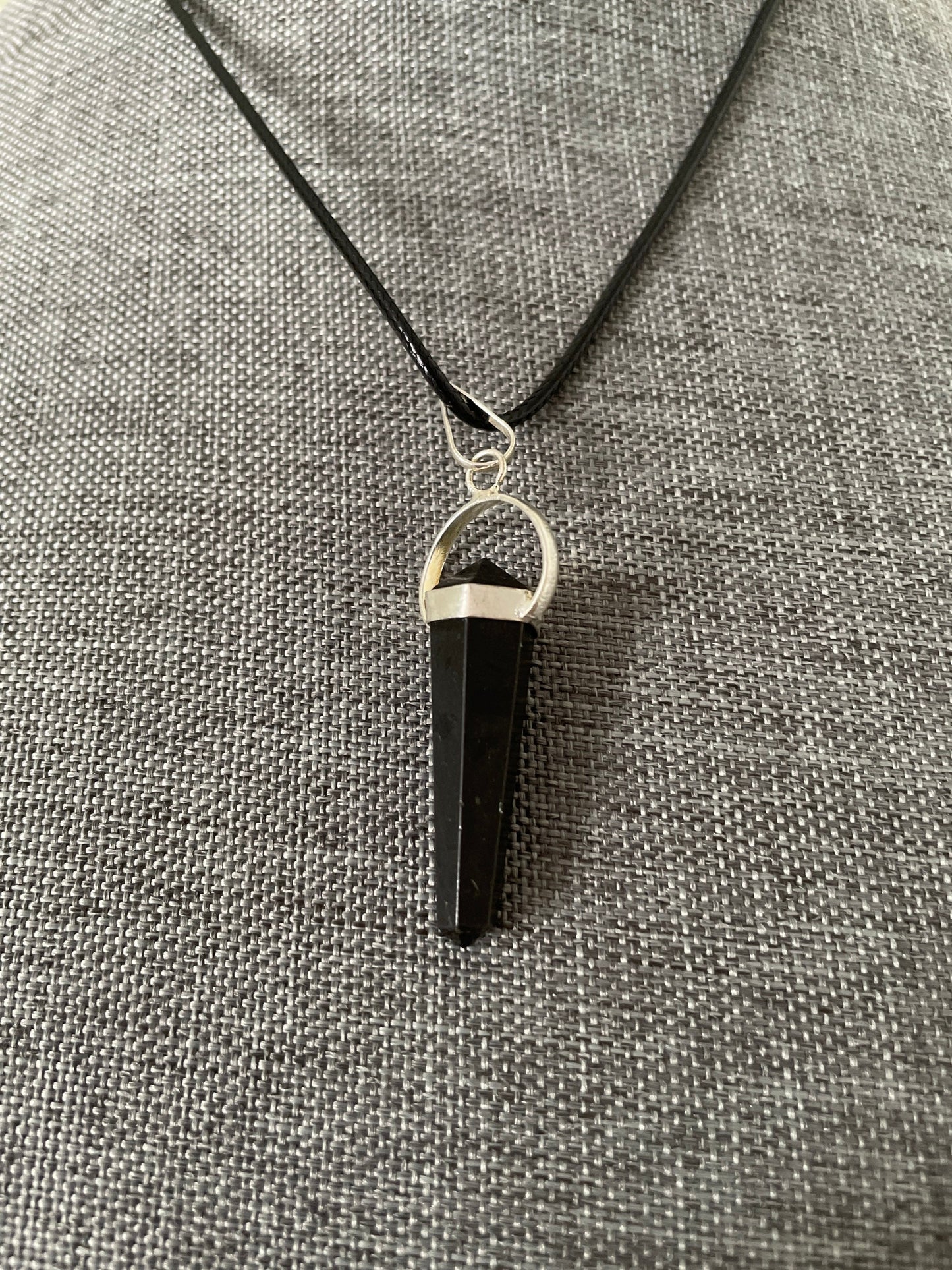 Super sharp looking black obsidian point necklace on black cord