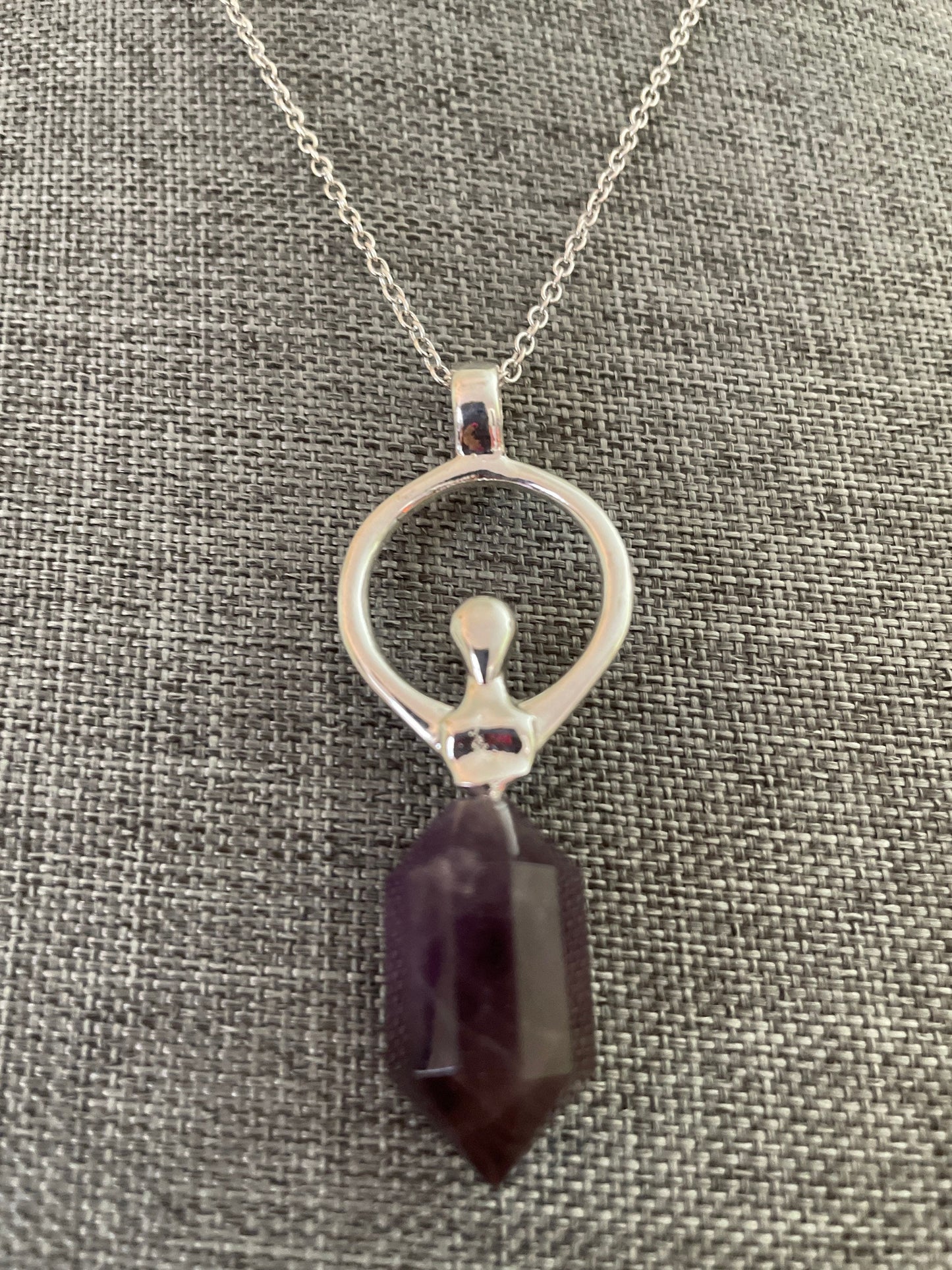 Beautiful silver and amethyst Goddess pendant on silver plated chain