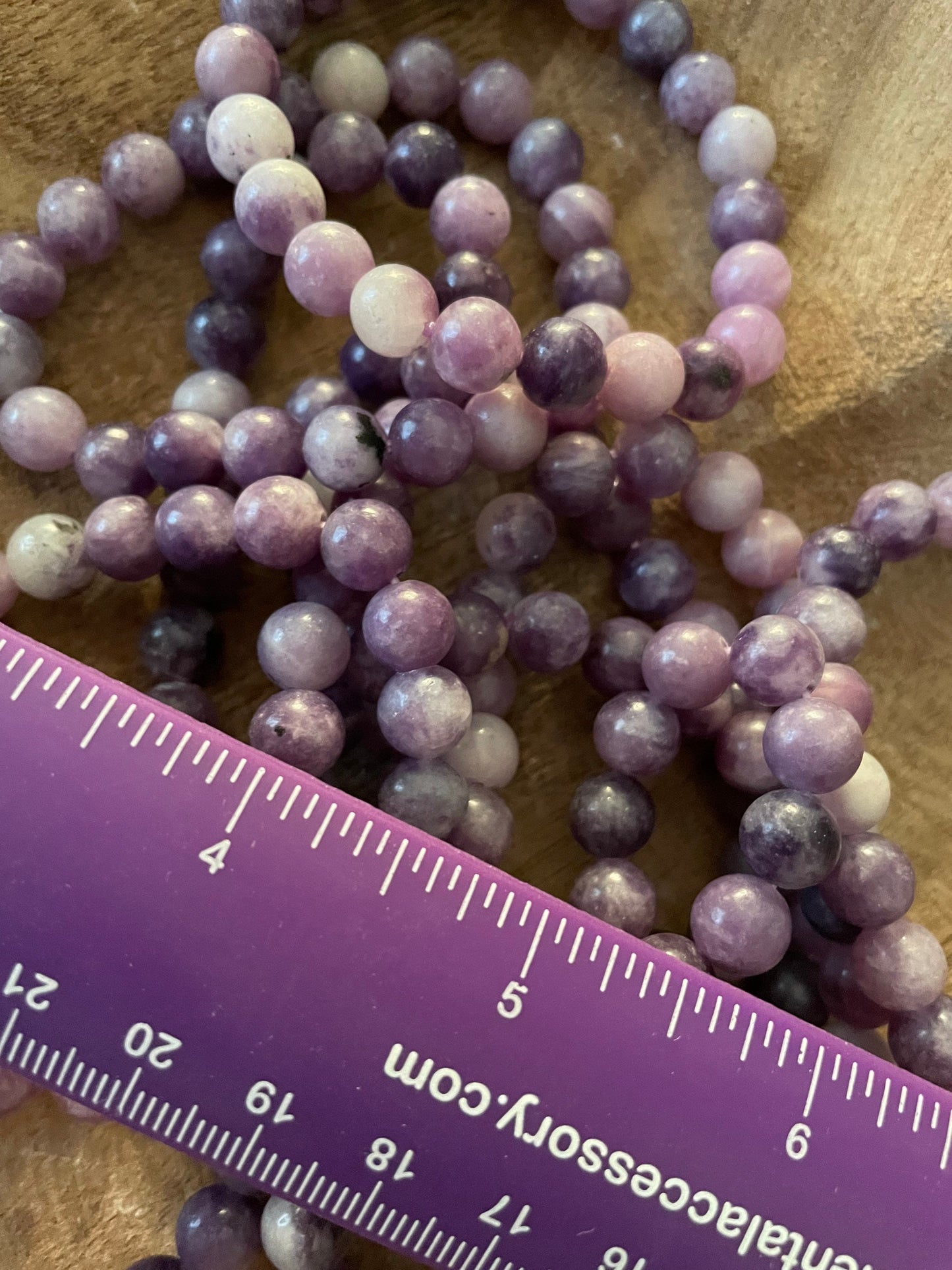 Beautiful Lepidolite 8mm bracelets on elastic band. One size fits all.