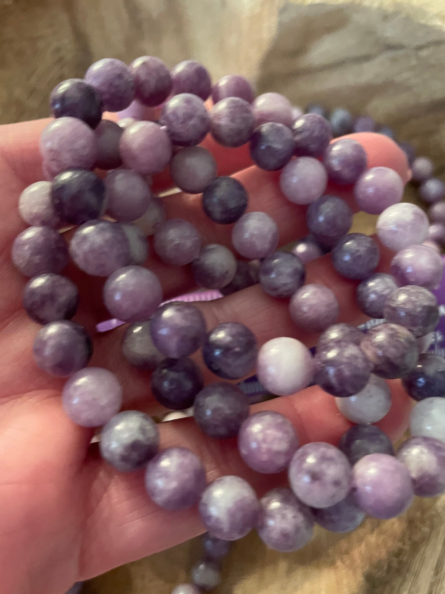 Beautiful Lepidolite 8mm bracelets on elastic band. One size fits all.