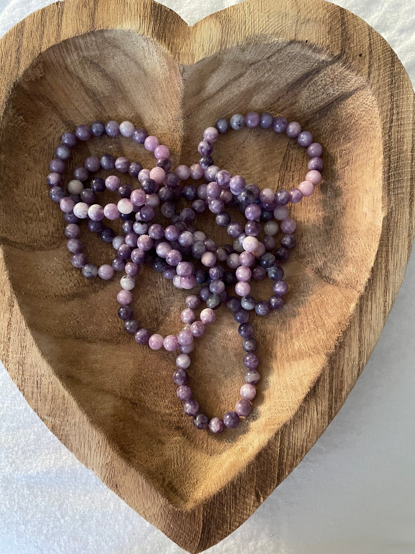 Beautiful Lepidolite 8mm bracelets on elastic band. One size fits all.