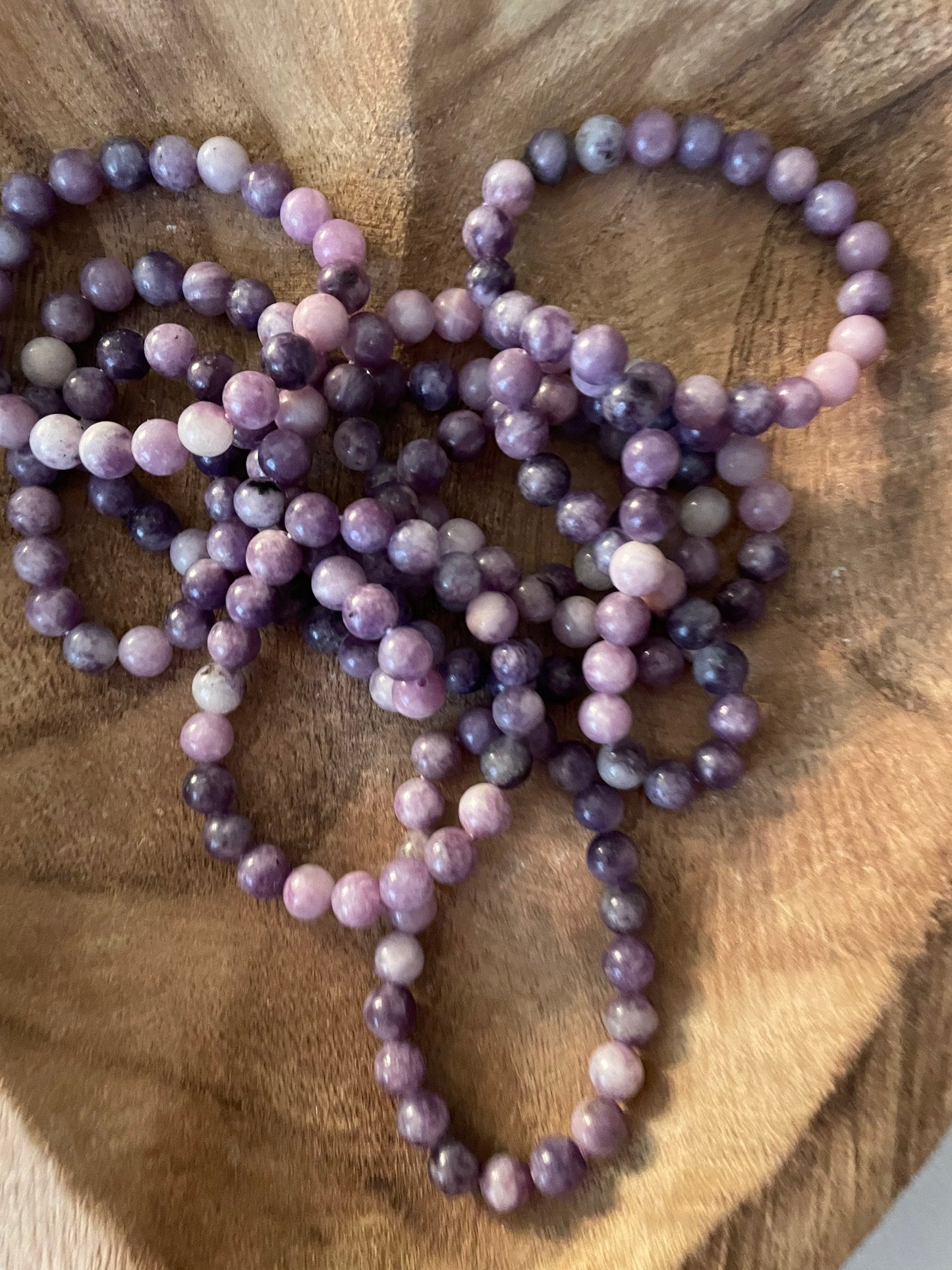 Beautiful Lepidolite 8mm bracelets on elastic band. One size fits all.