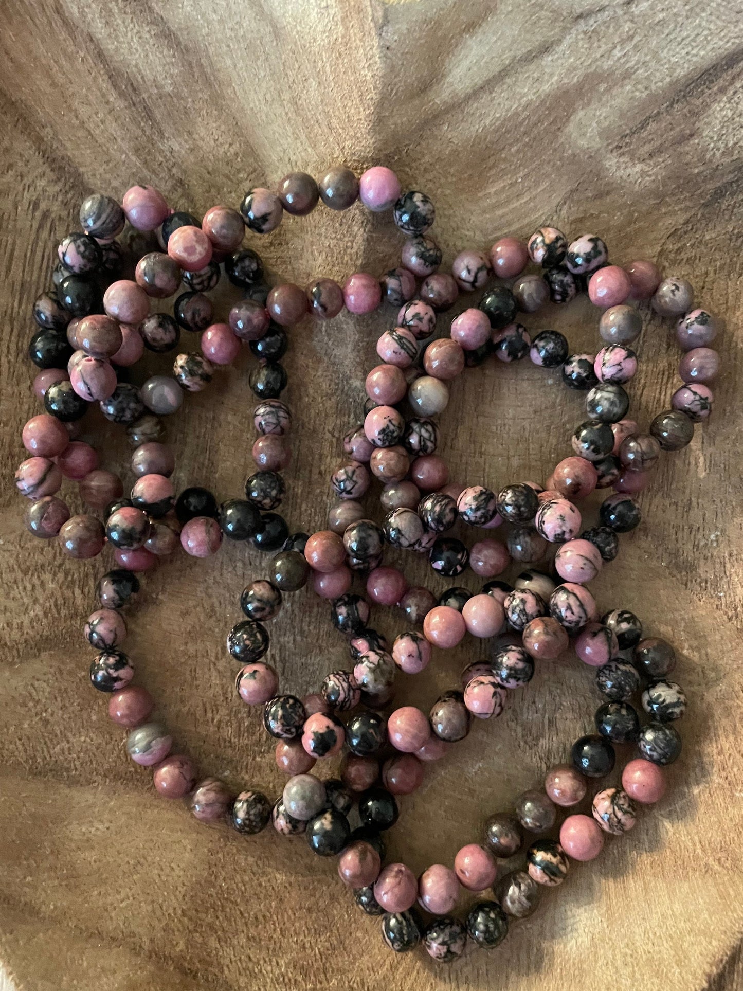 Beautiful Rhodonite 8mm bracelets. One size fits all.