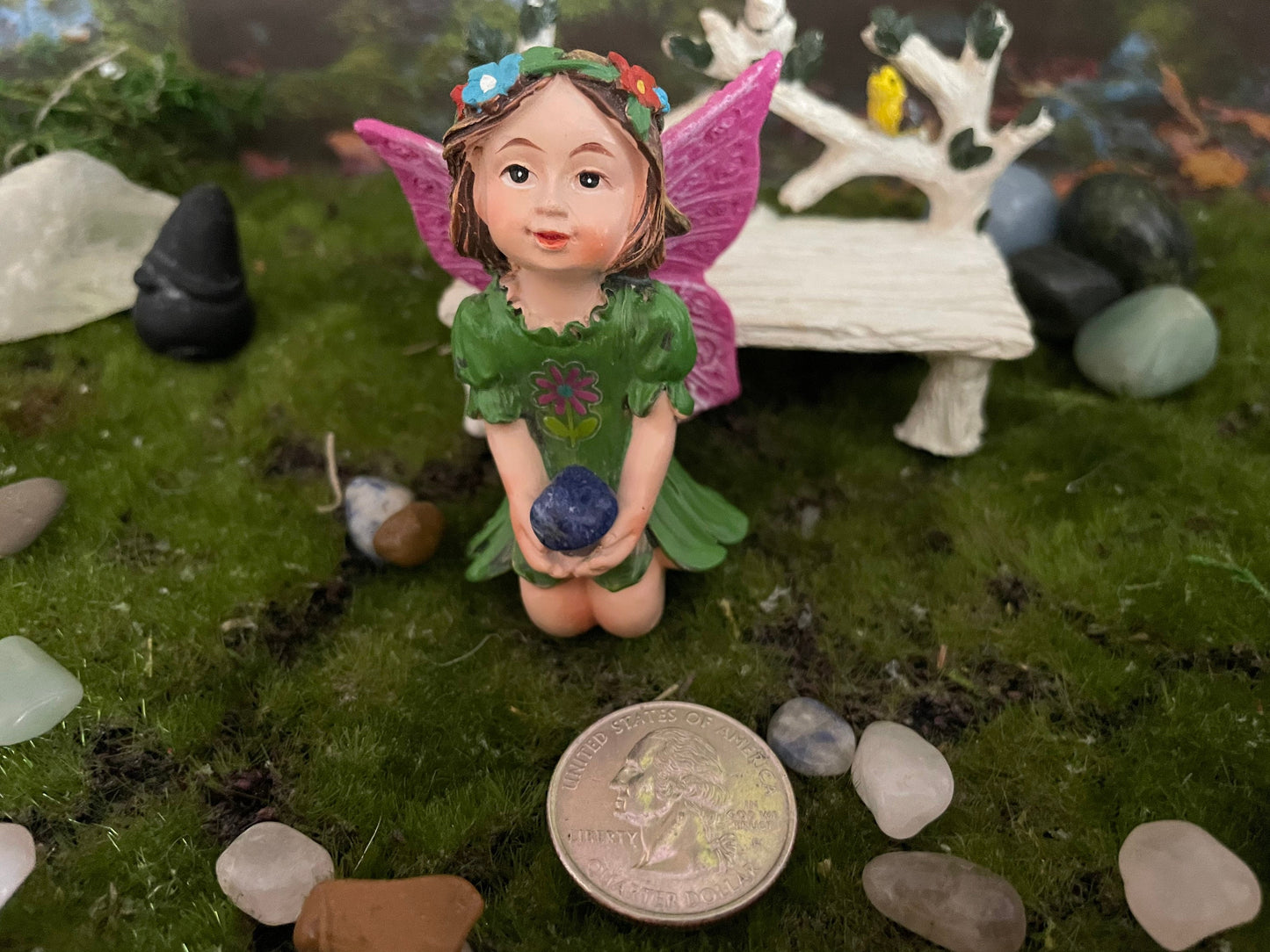 Look at her sweet face and she’s holding an Aventurine crystal hand-painted fairy with crystals