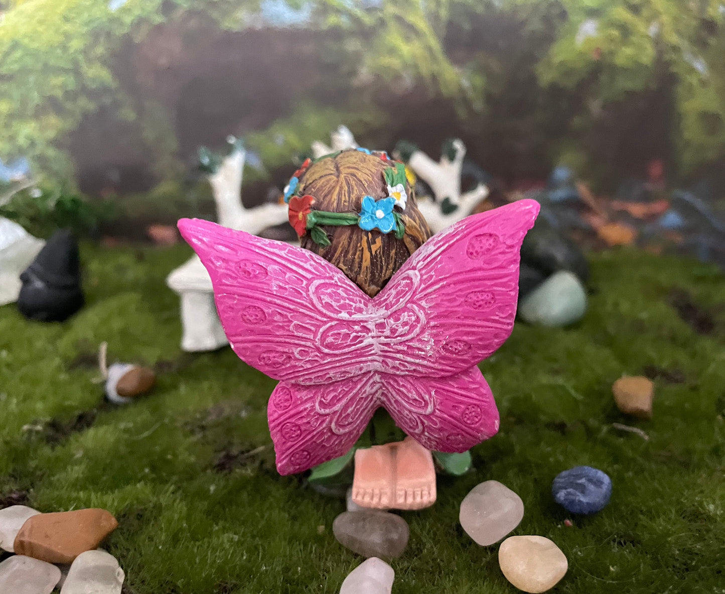 Look at her sweet face and she’s holding an Aventurine crystal hand-painted fairy with crystals