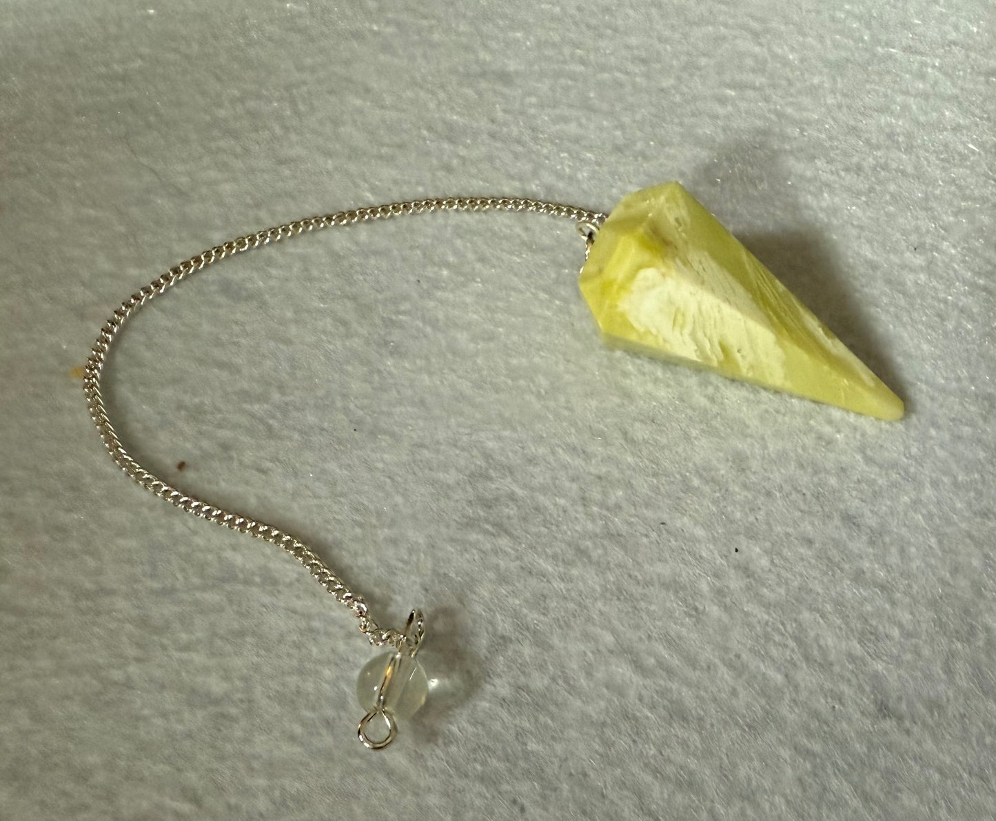 Beautiful Serpentine Pendulum is  1.5” and with chain is 8.5”
