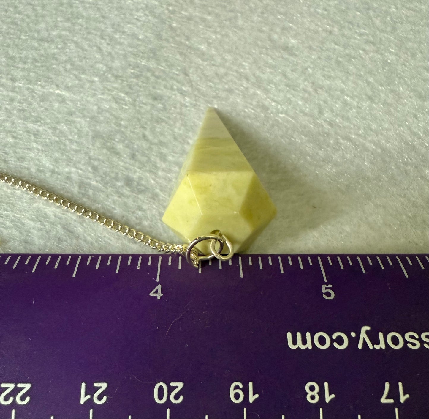 Beautiful Serpentine Pendulum is  1.5” and with chain is 8.75”