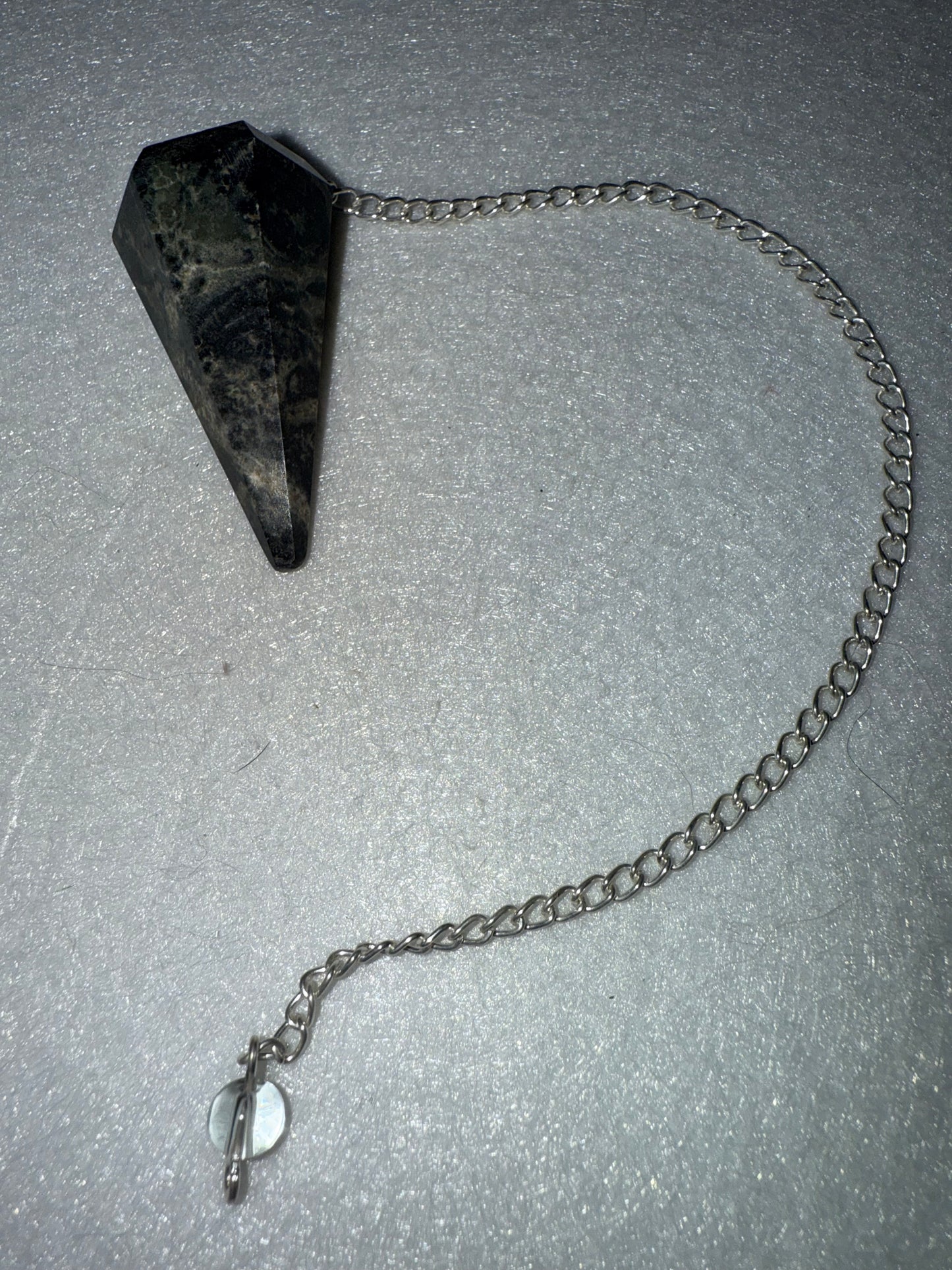 Unique Kambaba Jasper Pendulum is  1.5” and with chain is 9”
