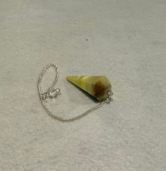 Beautiful Serpentine Pendulum is  1.5” and with chain is 8”.