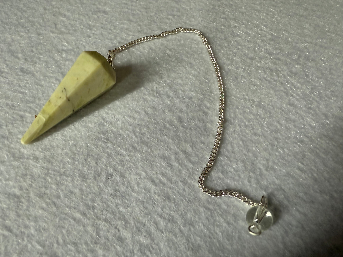 Awesome Serpentine Pendulum is  1.5” and with chain is 8.5”