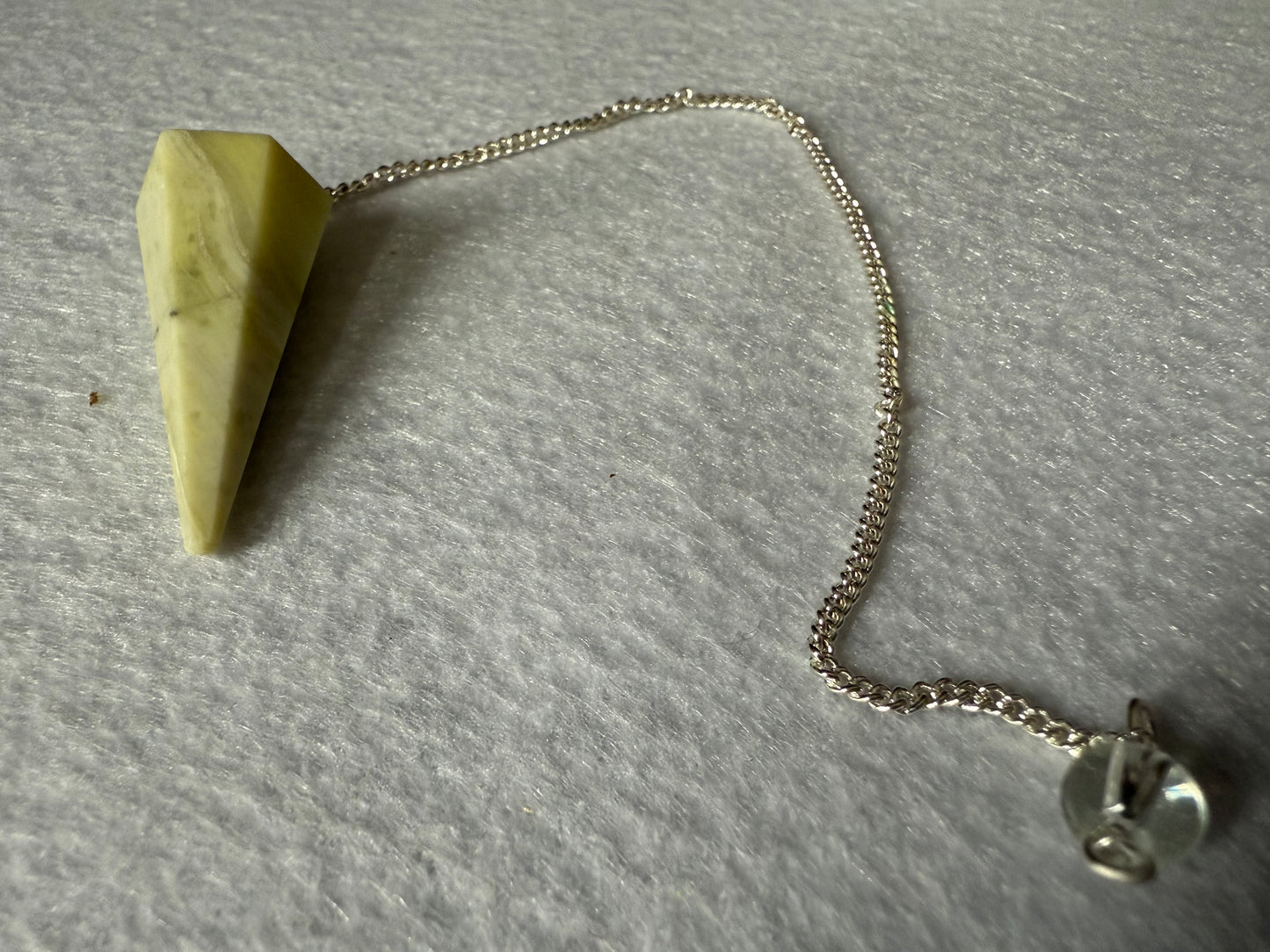 Awesome Serpentine Pendulum is  1.5” and with chain is 8.5”