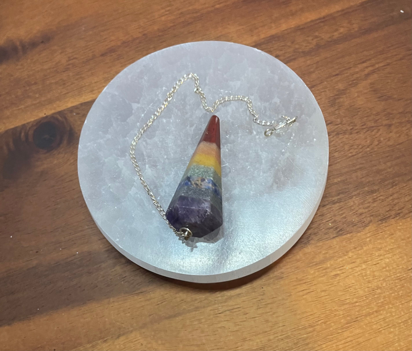 This beautiful Chakra Pendulum is approximately 8” in length.