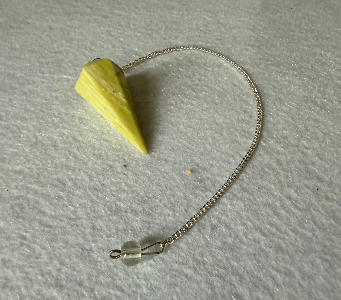 Awesome Serpentine Pendulum is  1.65” and with chain is 9”