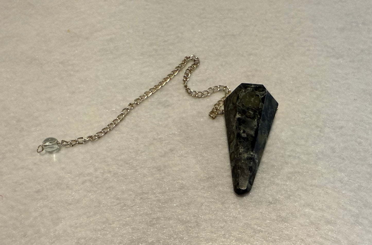 Pretty Kambaba Jasper Pendulum is  1.5” with chain is 9.25”