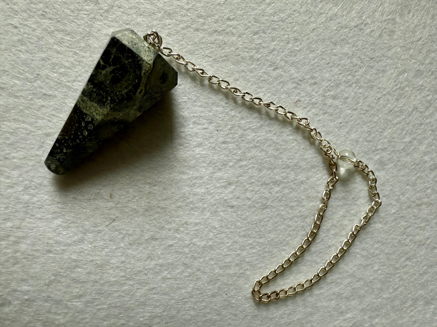 Awesome Kambaba Jasper Pendulum is  1.5” with chain is 9.75”