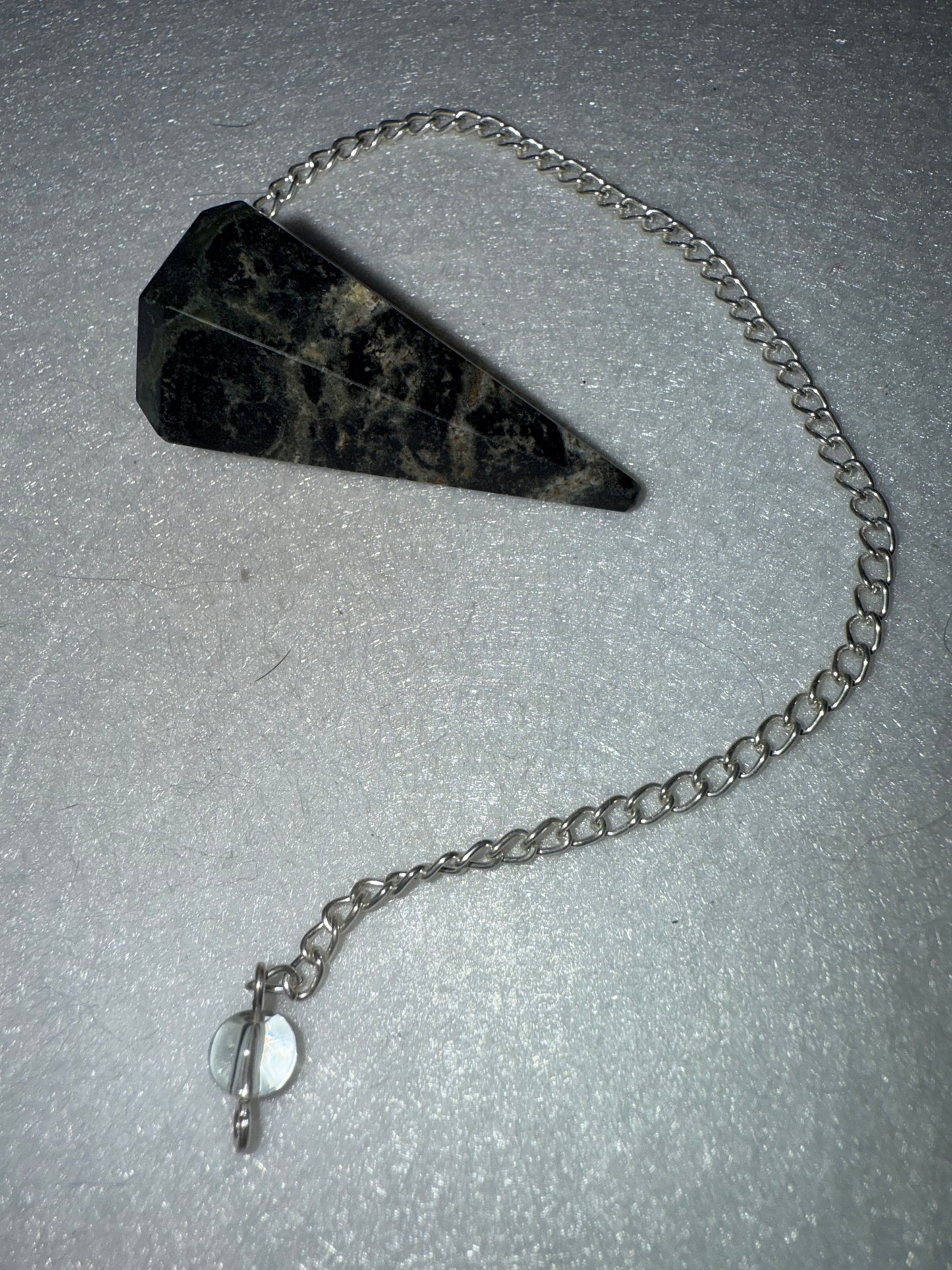 Unique Kambaba Jasper Pendulum is  1.5” and with chain is 9”